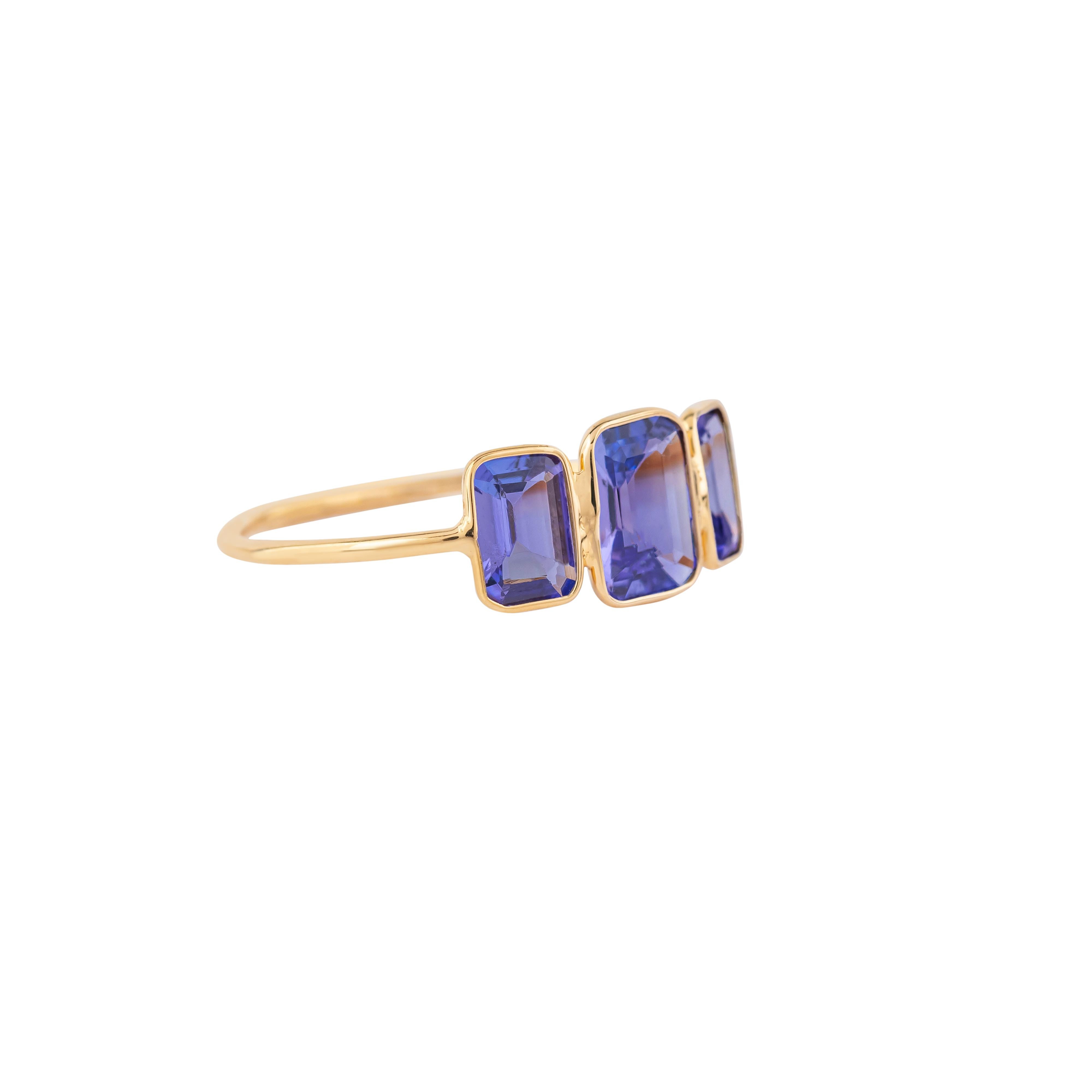 Step into the world of elegance with our 18 Karat Gold 1.7 Carat Tanzanite Three Stone Ring – a masterpiece crafted to captivate the senses and adorn your hand with sophistication. Each ring is meticulously crafted and curated, showcasing the