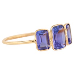 Anello con tre pietre di tanzanite in oro 18 carati da 1,7 carati