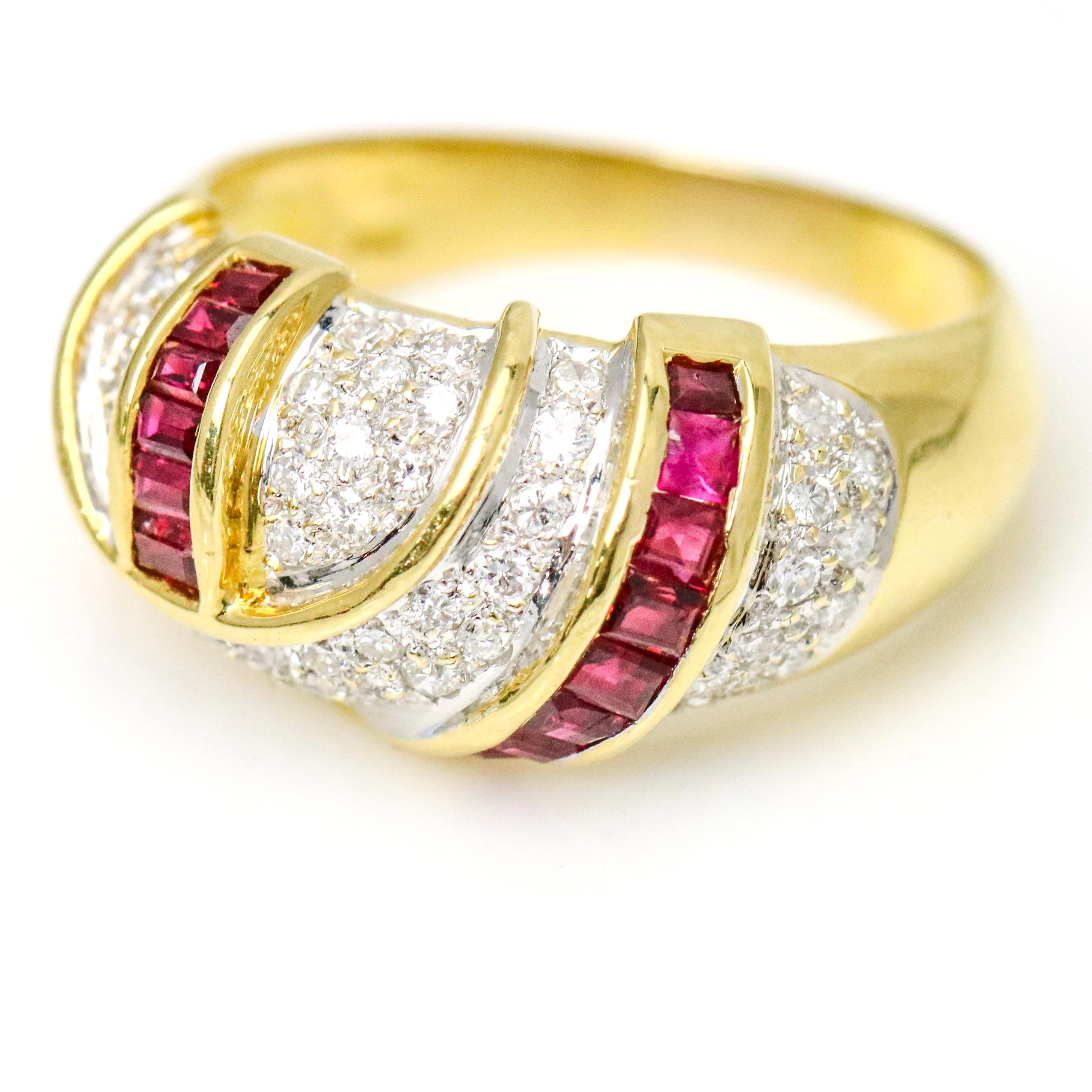 Ruby and Diamond band in 18 karat yellow gold. Size 9.5. The ring is pave set with diamonds and channel set with 14 baguette cut rubies. The estimated total carat weight of diamonds is, 1ct. Approximate carat weight of rubies, .80 carats.

Weight,
