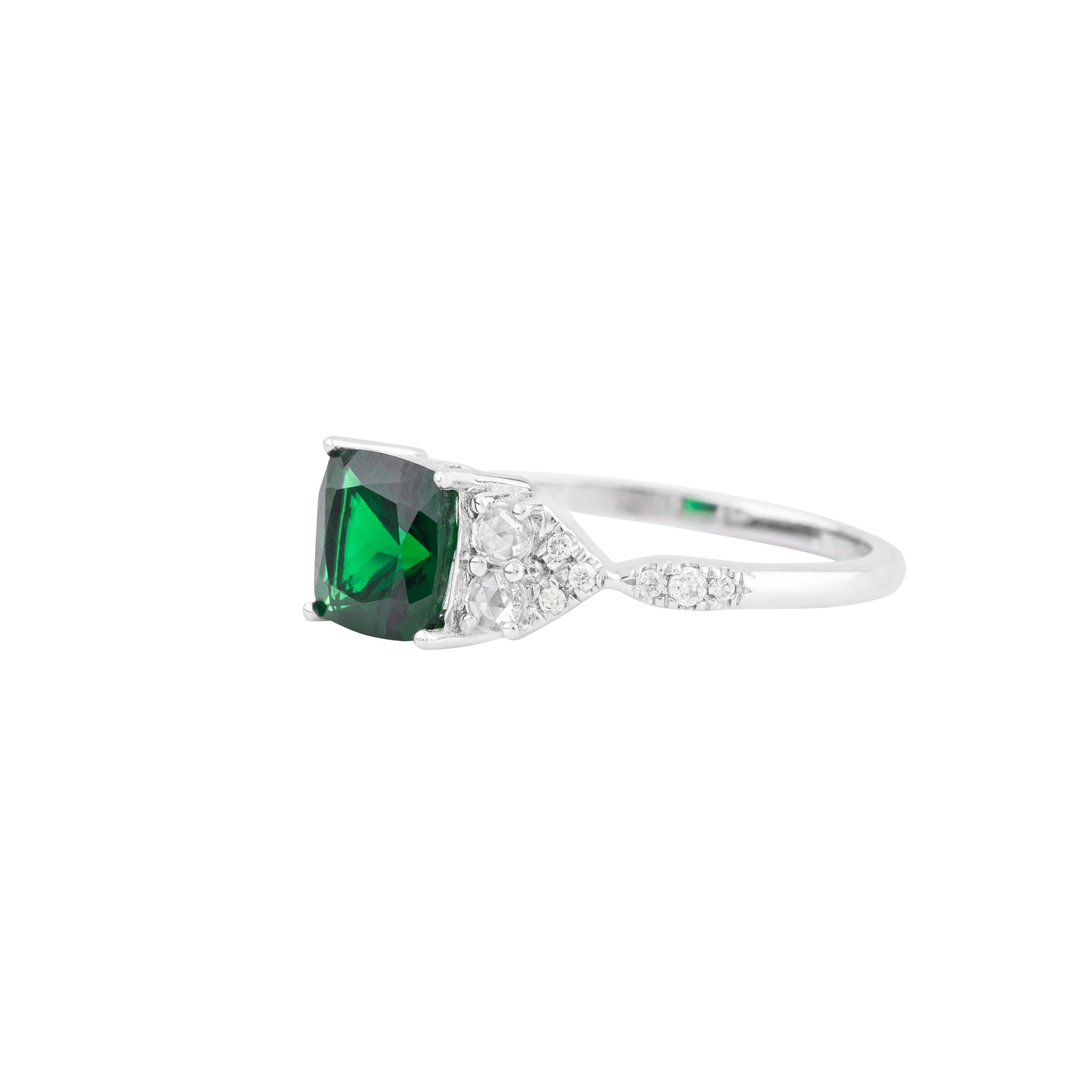 A stunning blend of classic elegance and modern allure defines this 18 Karat Gold 1.95 Carat Diamond and Tsavorite Fashion Ring. Crafted with precision, this piece is a tribute to refined luxury, showcasing the intricate interplay of sparkling