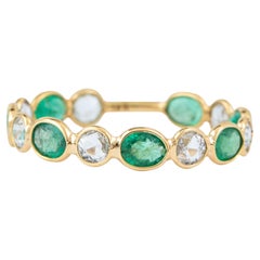 18 Karat Gold 1.95 Carat White Sapphires and Emerald Eternity Ring