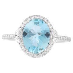 Anillo de moda moderno de oro de 18 quilates con diamantes y aguamarina de 2 quilates