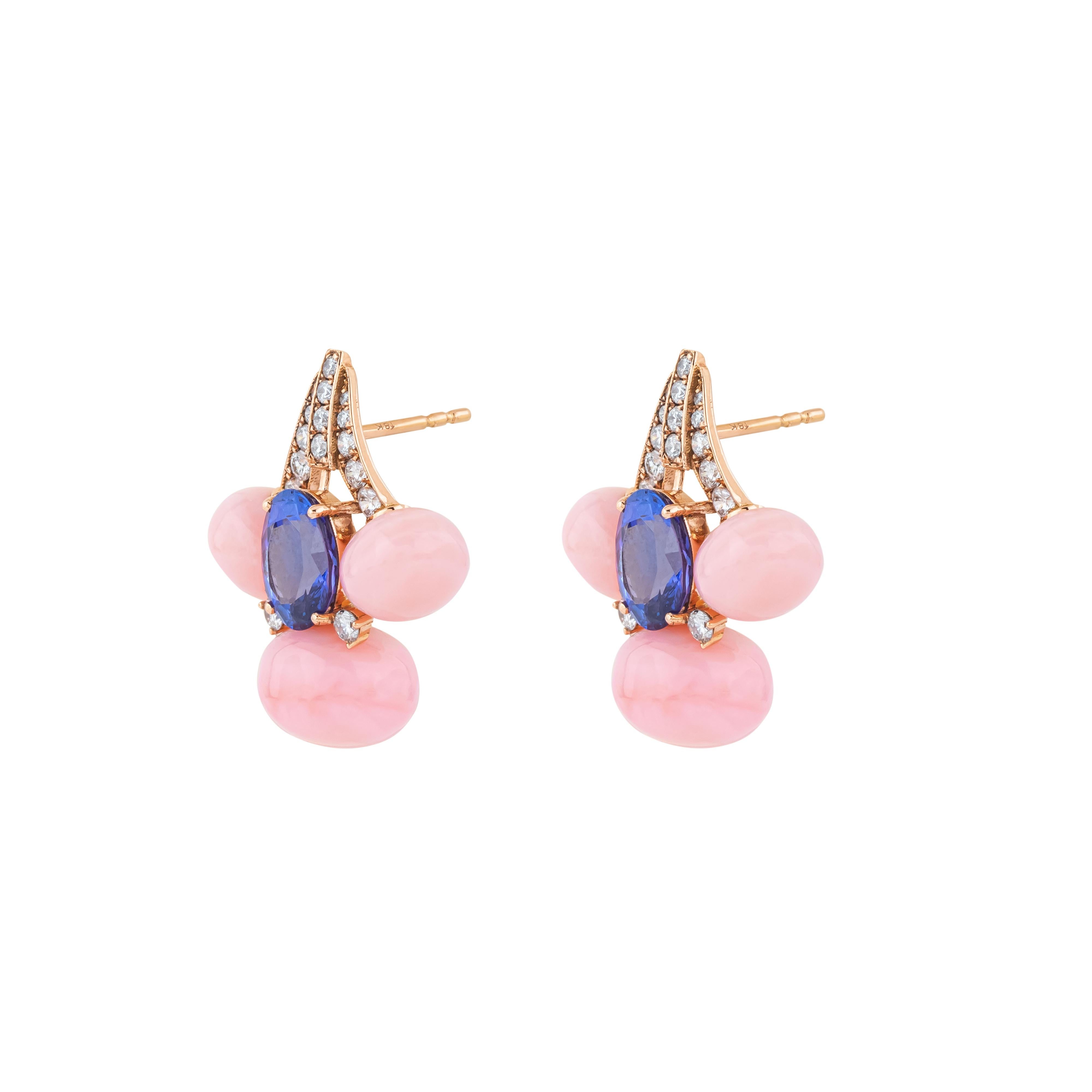 Discover the timeless elegance of 18 Karat Gold 22.5 Carat Diamond, Opal, and Tanzanite Stud Earrings. Each piece is uniquely crafted and curated, combining luxurious materials with exceptional craftsmanship to create an unforgettable addition to