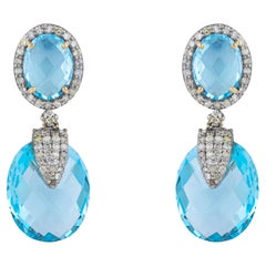 Pendientes de oro de 18 quilates con diamantes de 23,25 quilates y topacio azul