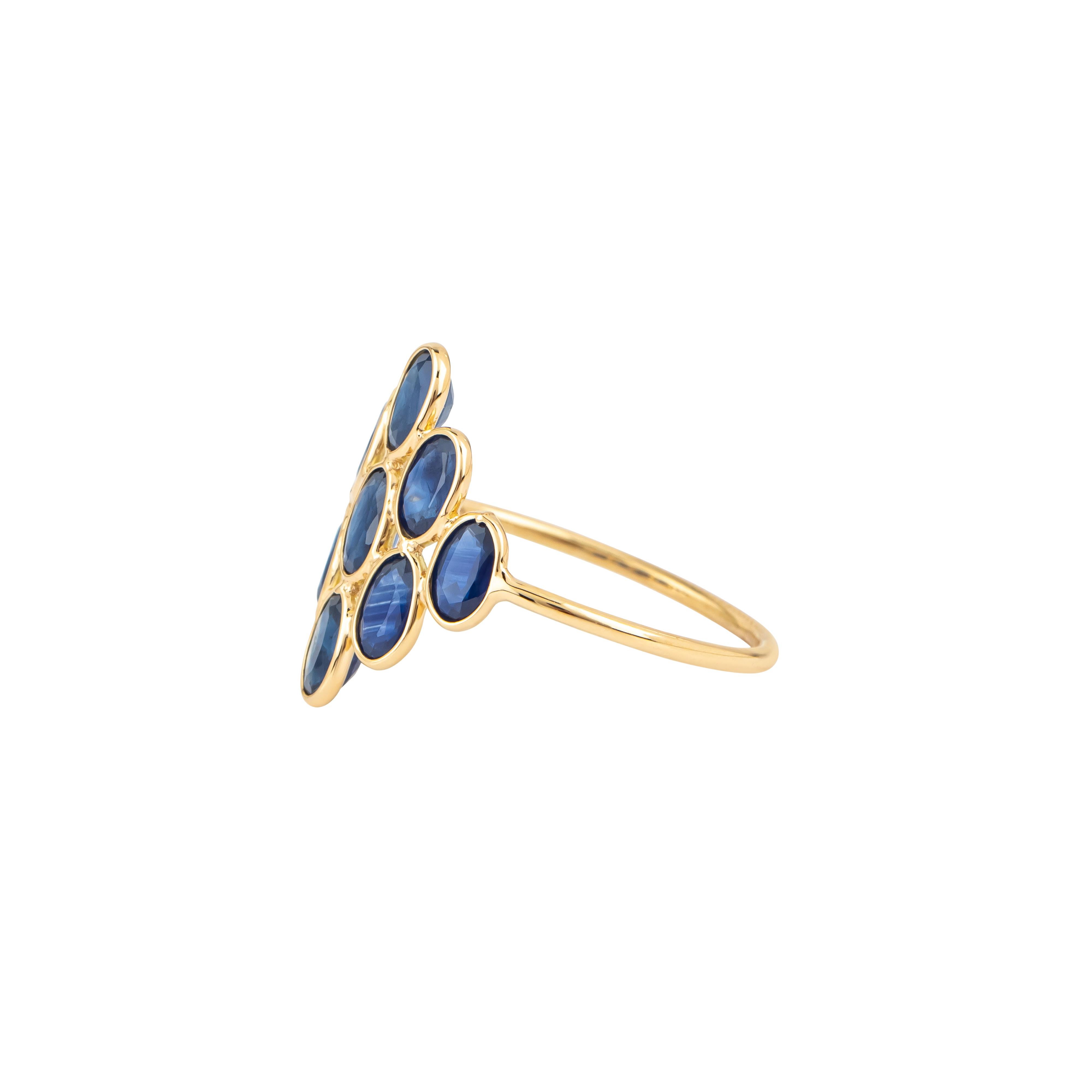 The 18 Karat Gold 2.35 Carat Sapphire Cocktail Ring captures attention with its sophisticated design and vibrant gemstone arrangement. Featuring a centerpiece of 2.35 carats of stunning sapphires, this cocktail ring reflects a bold yet timeless