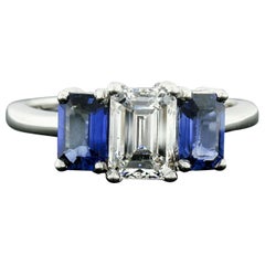18 Karat Gold 2.45 Carat GIA Emerald Cut Diamond and Sapphire 3 Three Stone Ring