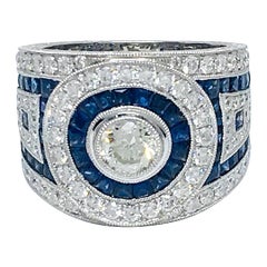 18 Karat Gold 2.55 Carat Sapphire and 1.87 Carat Diamonds Ring