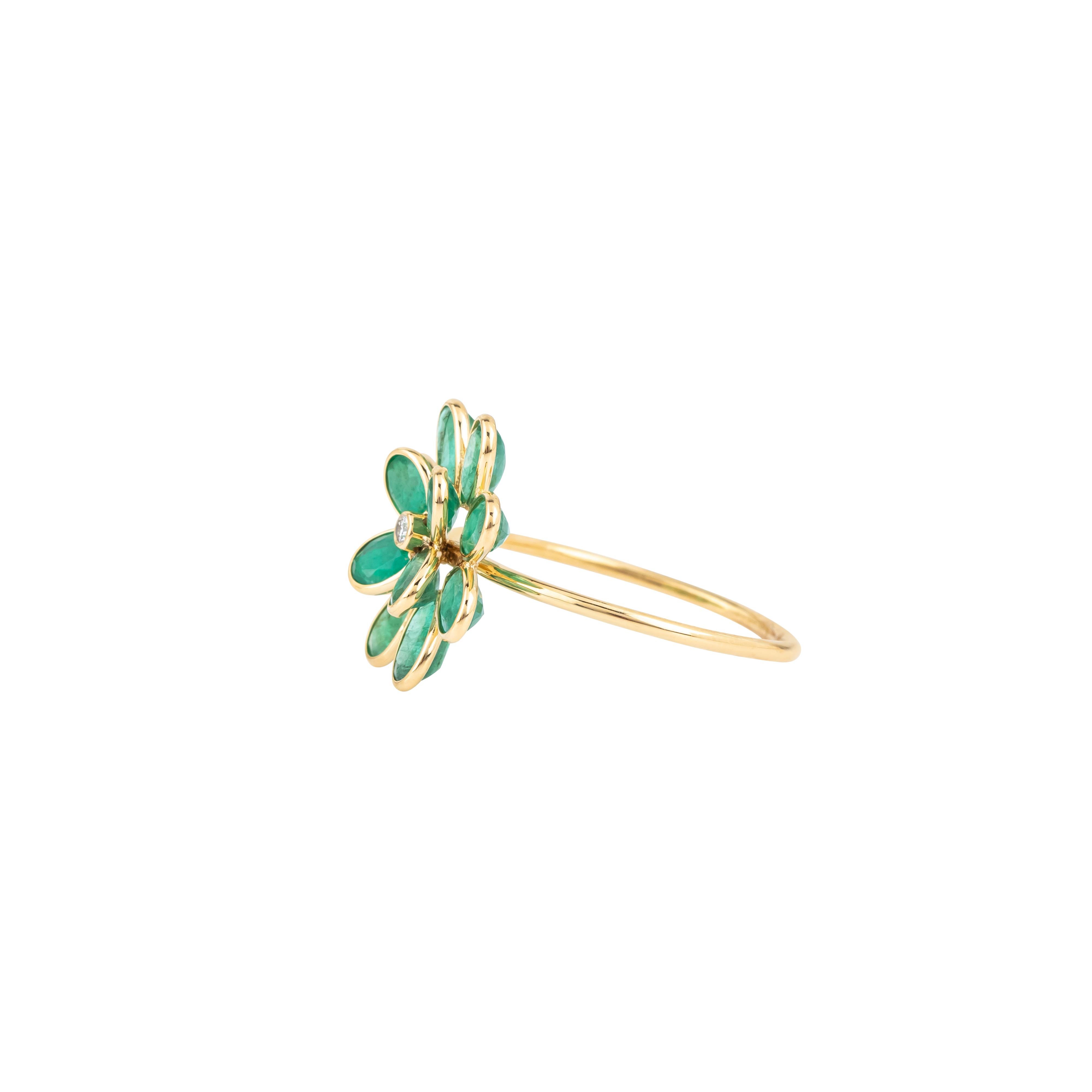 Modern 18 Karat Gold 2.57 Carat Diamond and Emerald Flower Ring