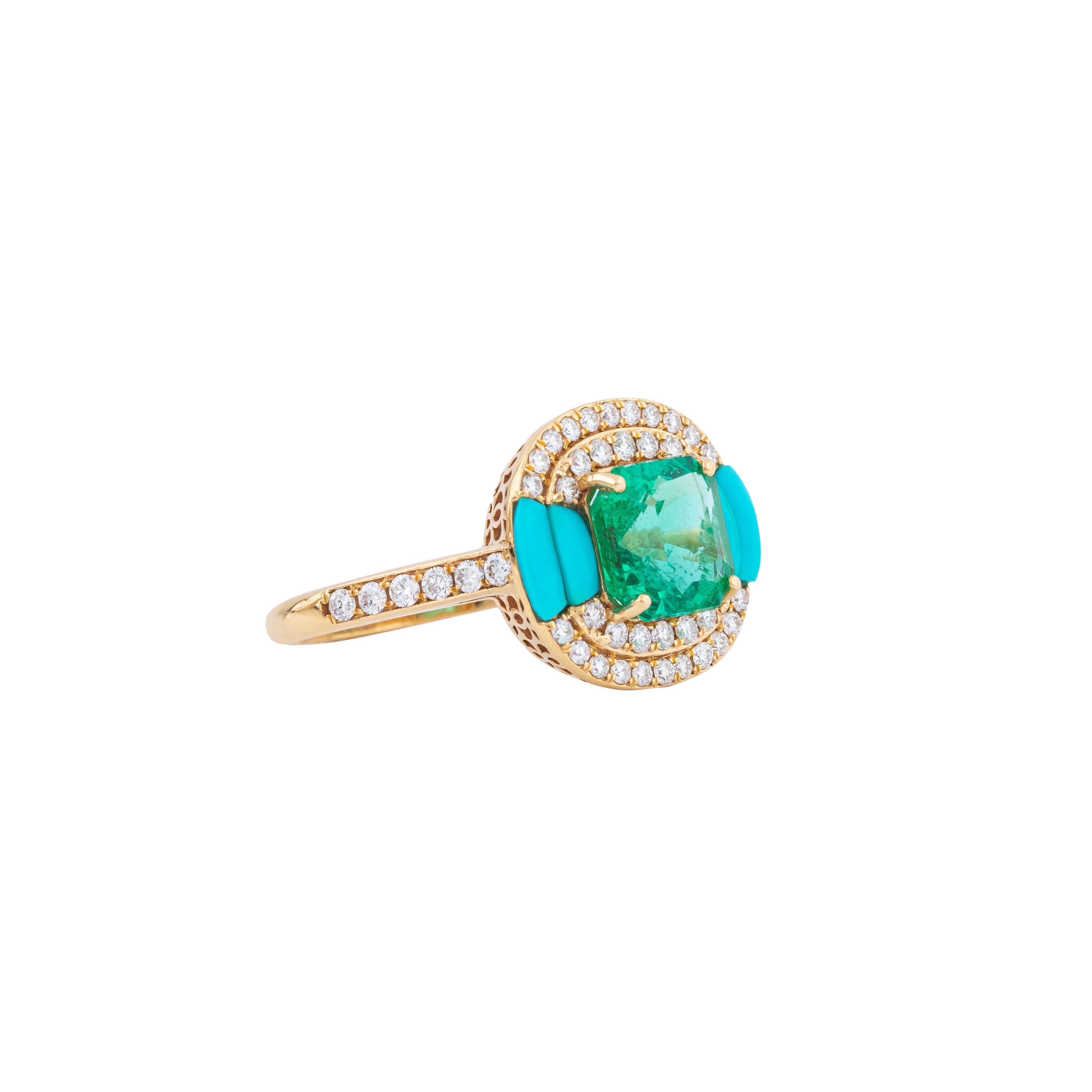 Exemplifying elegance and artistic craftsmanship, the 18 Karat Gold Fashion Ring is adorned with a 2.65 carat diamond, emerald, and turquoise, creating a piece of unparalleled beauty. The central diamond, with its exceptional clarity and brilliance,