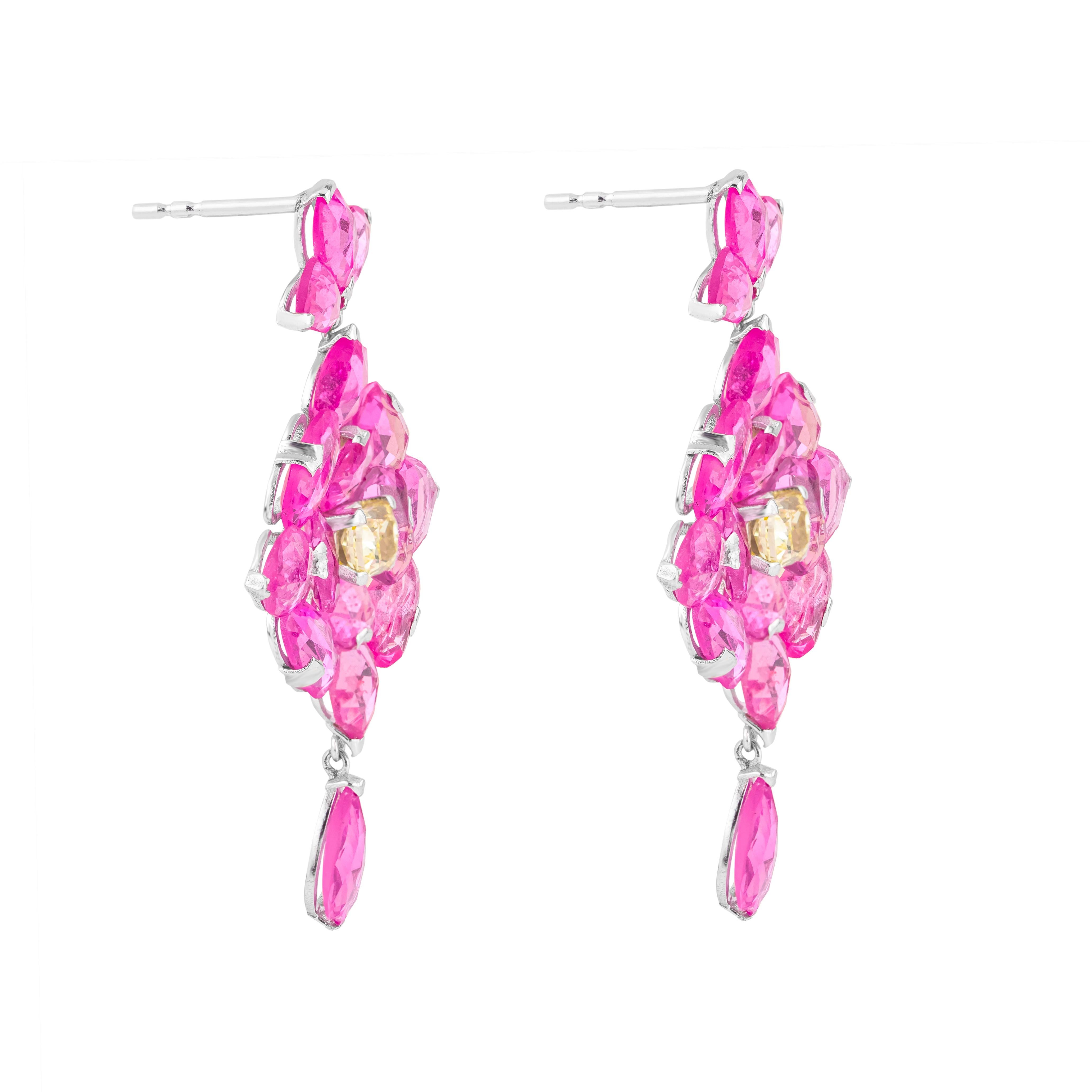 Step into the realm of opulence with our 18 Karat Gold 26.5 Carat Pink Sapphire & Yellow Diamond Drop Earrings. Crafted with unparalleled artistry, each pair is a testament to exquisite design and meticulous attention to detail.

Fashioned from
