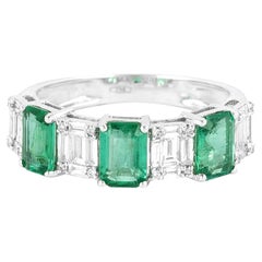 18 Karat Gold 2.7 Carat Diamond and Emerald Eternity Ring
