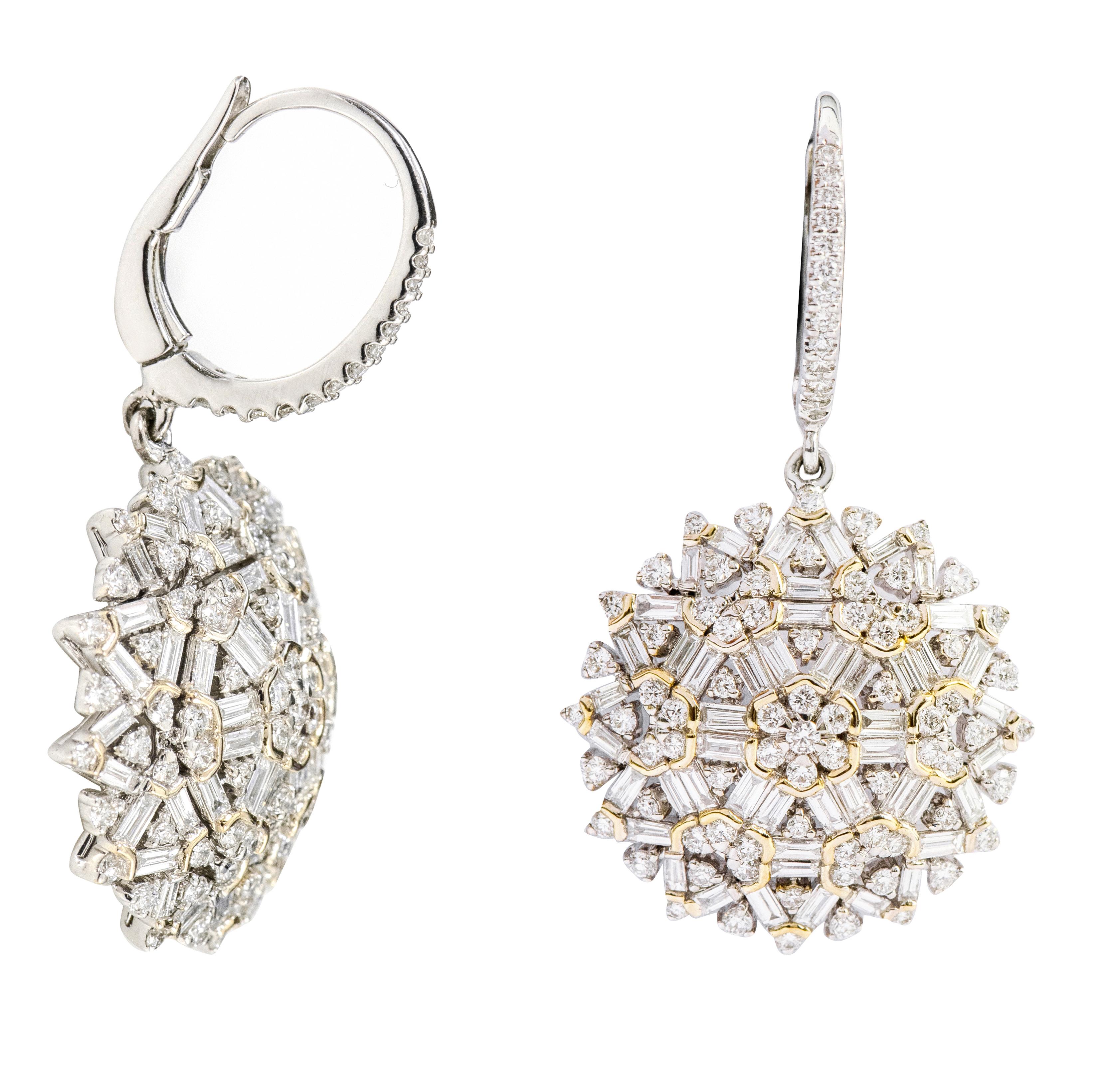 18 Karat Gold 2.75 Carat Diamond Dangle Earrings

This fascinating mix shape diamond floral earring pair is incredible. It’s a sophisticated and very intricate design setting wherein the first layer is formed with 7 identical round diamonds,