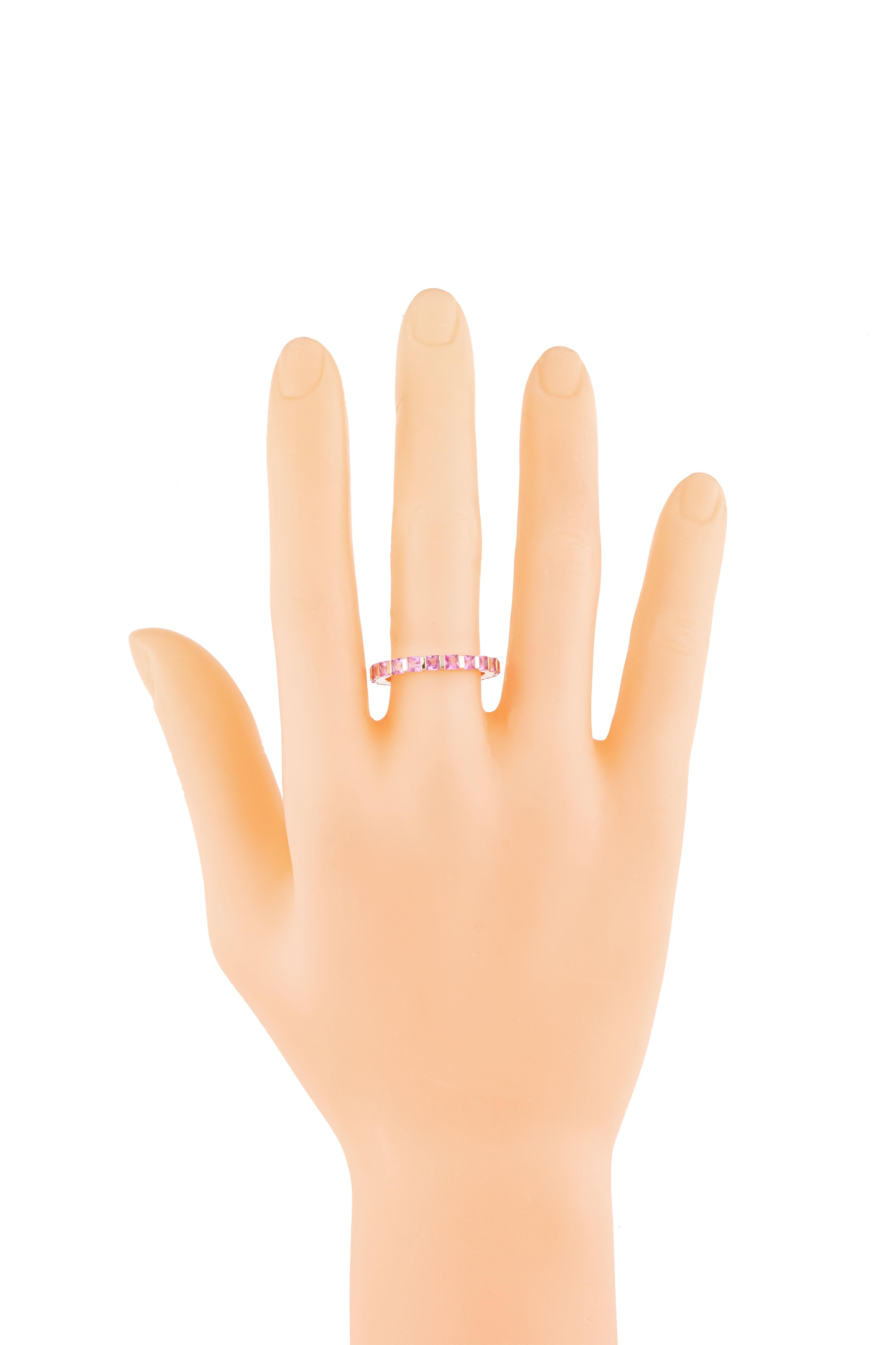Experience the epitome of elegance with our 18 Karat Gold 2.82 Carat Pink Sapphire Eternity Ring – a timeless symbol of everlasting love and sophistication. Each ring is meticulously crafted and curated to showcase the perfect fusion of luxury and