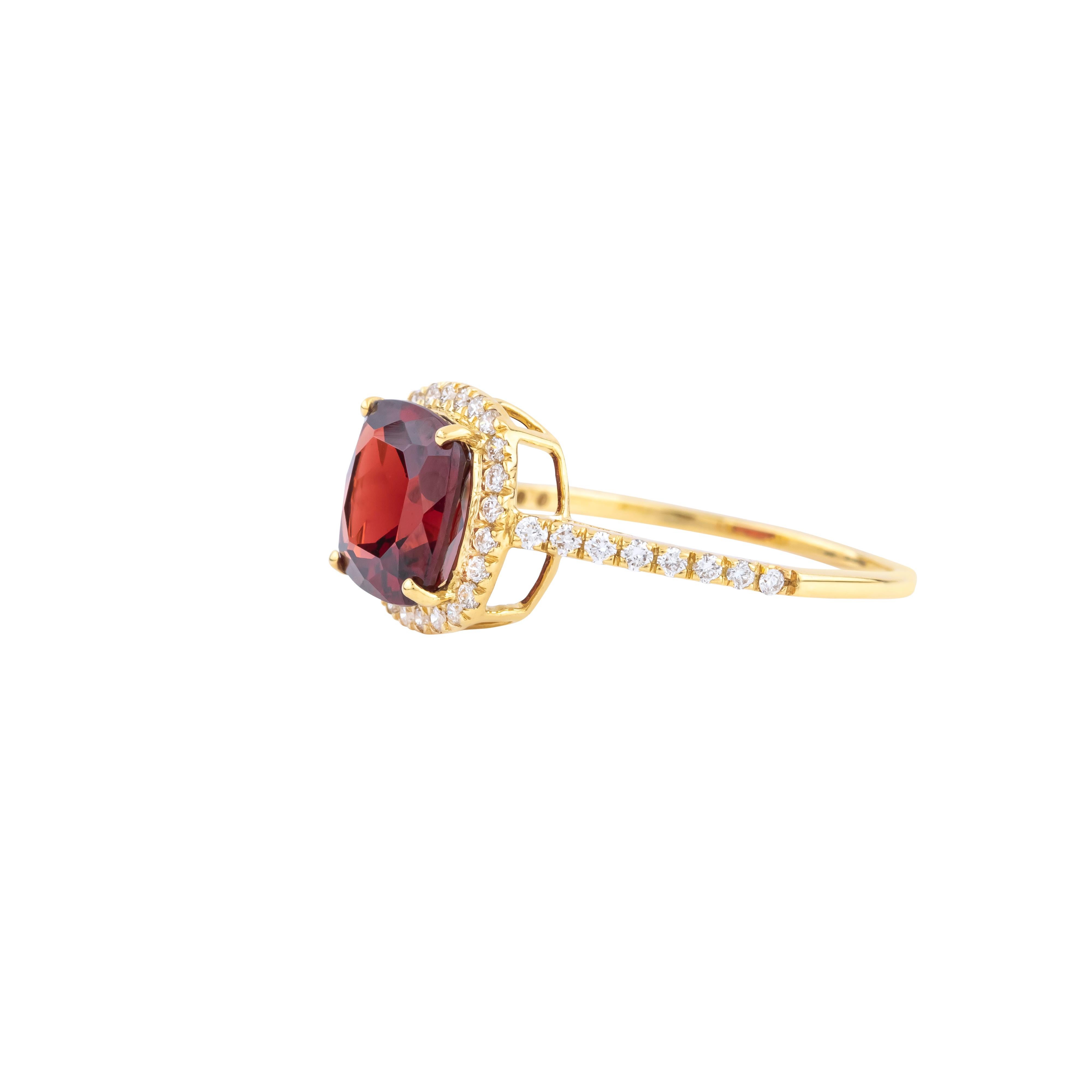 Elegance and drama converge in the design of this 18 Karat Gold 2.85 Carat Diamond and Garnet Cocktail Ring. Dominating the composition is a richly-hued garnet, weighing an impressive 2.85 carats. The gemstone’s meticulously faceted surface catches