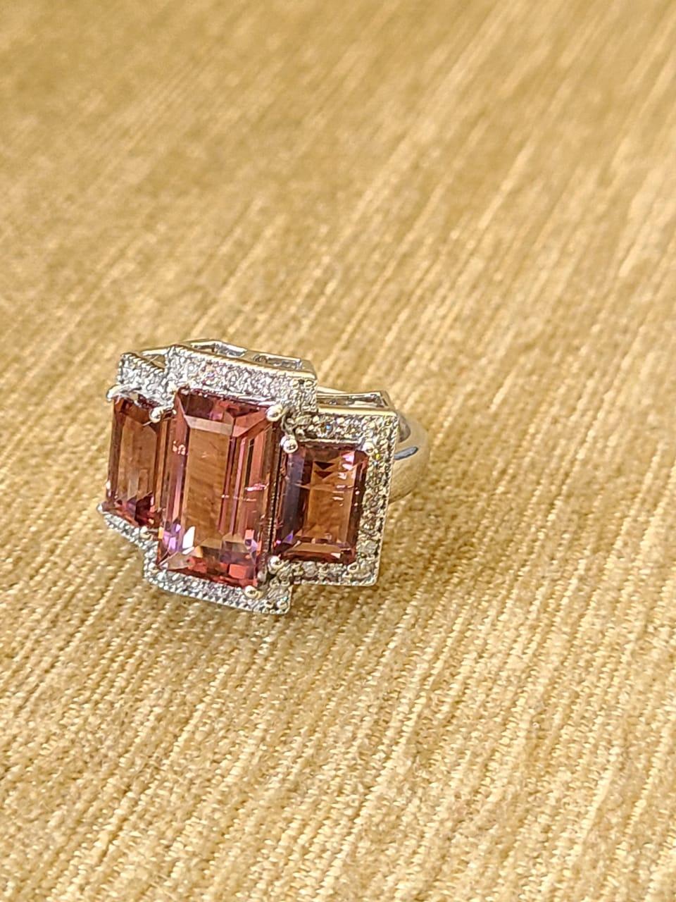 A gorgeous and very wearable Tourmaline & Diamonds cocktail Ring set in 18K Gold. The weight of the Tourmaline is 7.08 carats. The Tourmalines are completely natural, without any treatment. The weight of the Diamonds is 0.52 carats. The dimensions