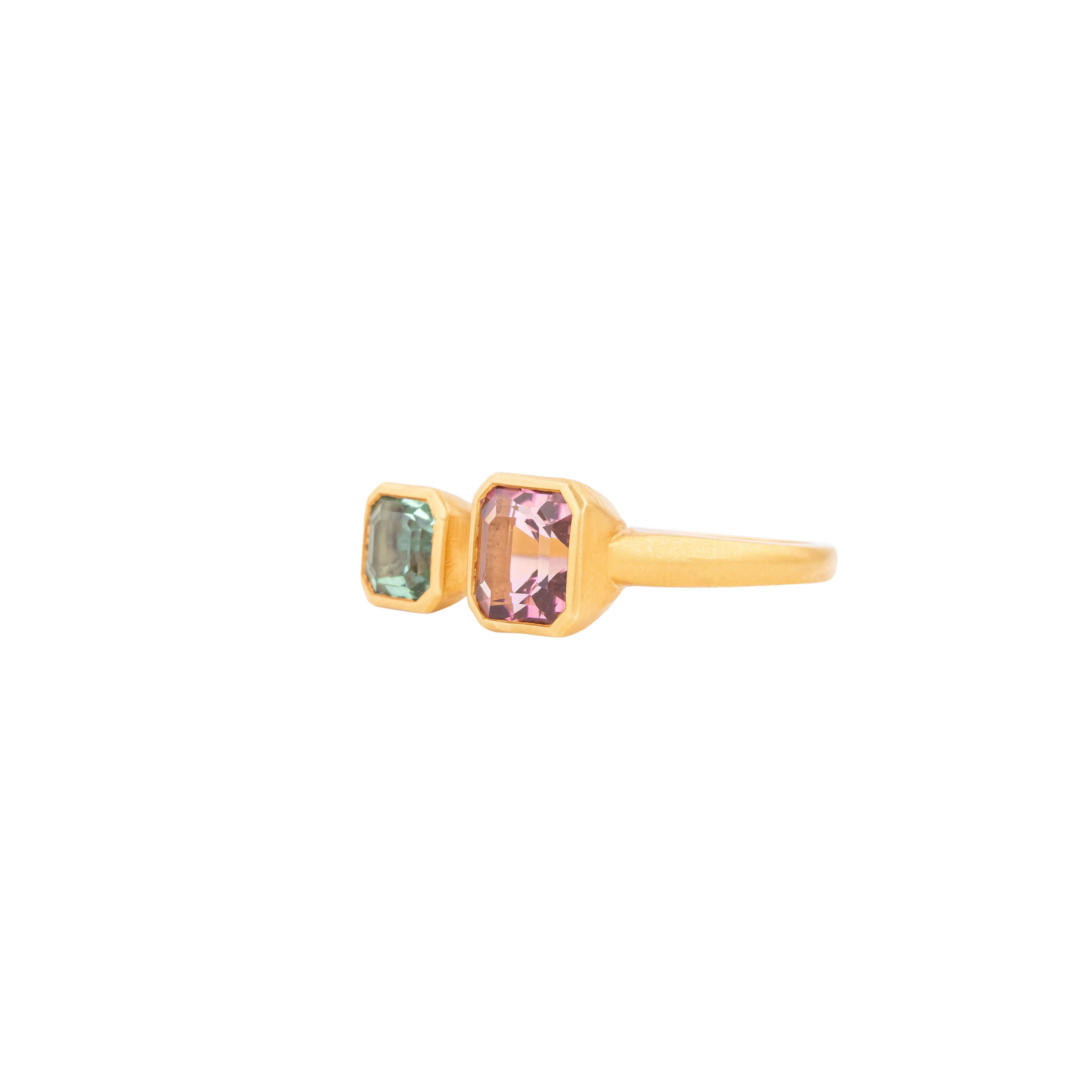 An exquisite showcase of artistry and elegance, the 18 Karat Gold Fashion Ring features a 3.21 carat tourmaline that captivates with its vibrant hues and brilliant clarity. The centerpiece tourmaline, known for its unique ability to display a