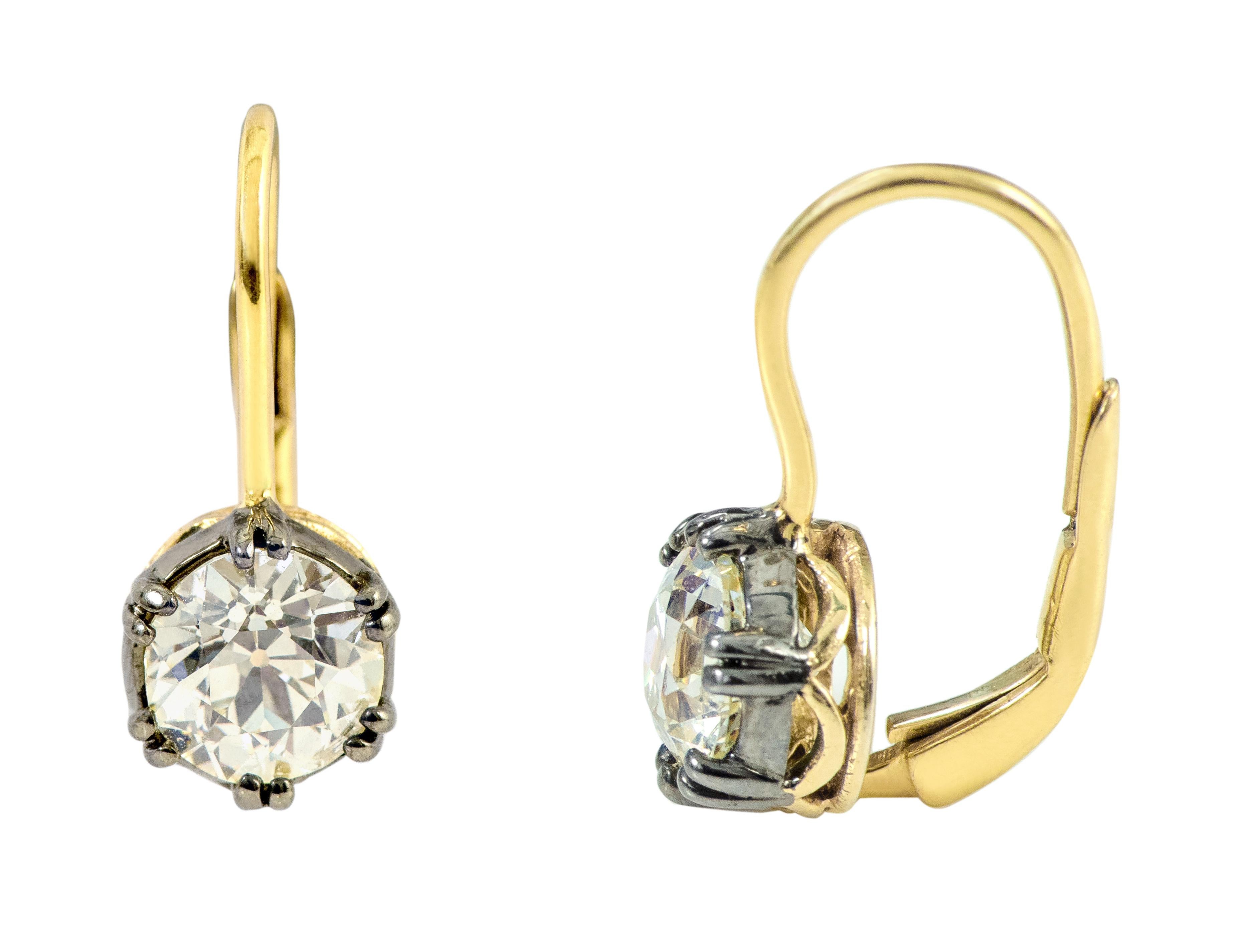 18 Karat Gold 3.22 Carat Old European Cut Diamond Solitaire Drop Earrings

This perfect old mutual/European cut diamond solitaire pair is exceptional. The diamond pair of 3.22 carat is an antique 58 facet cut without the precision of the modern