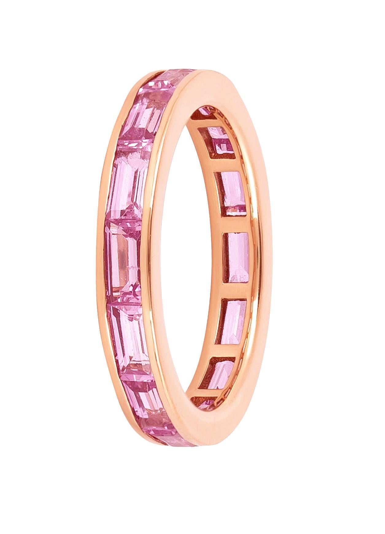 Indulge in the splendor of the 18 Karat Gold 3.29 Carat Pink Sapphire Infinity Statement Ring, a mesmerizing jewel that captures the heart with its timeless elegance and vibrant allure. This piece is a fusion of artistry and sophistication, where