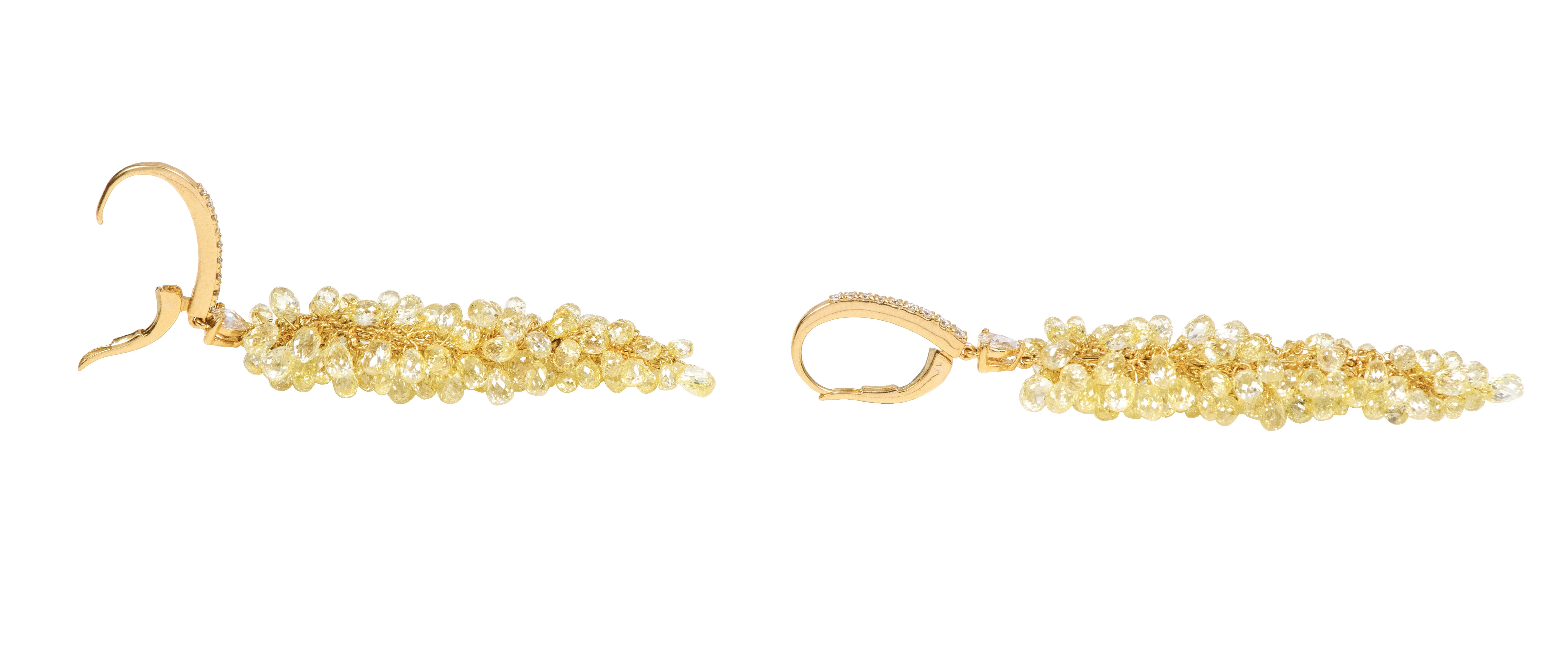18 Karat Gold 34.56 Carat Fancy Diamond Briolette Drop Earrings

Elevate your style with our exquisite Fancy Diamond Briolette Drop Earrings, a stunning blend of fancy diamonds, rose-cut diamonds, and modern diamond huggies. These earrings are a