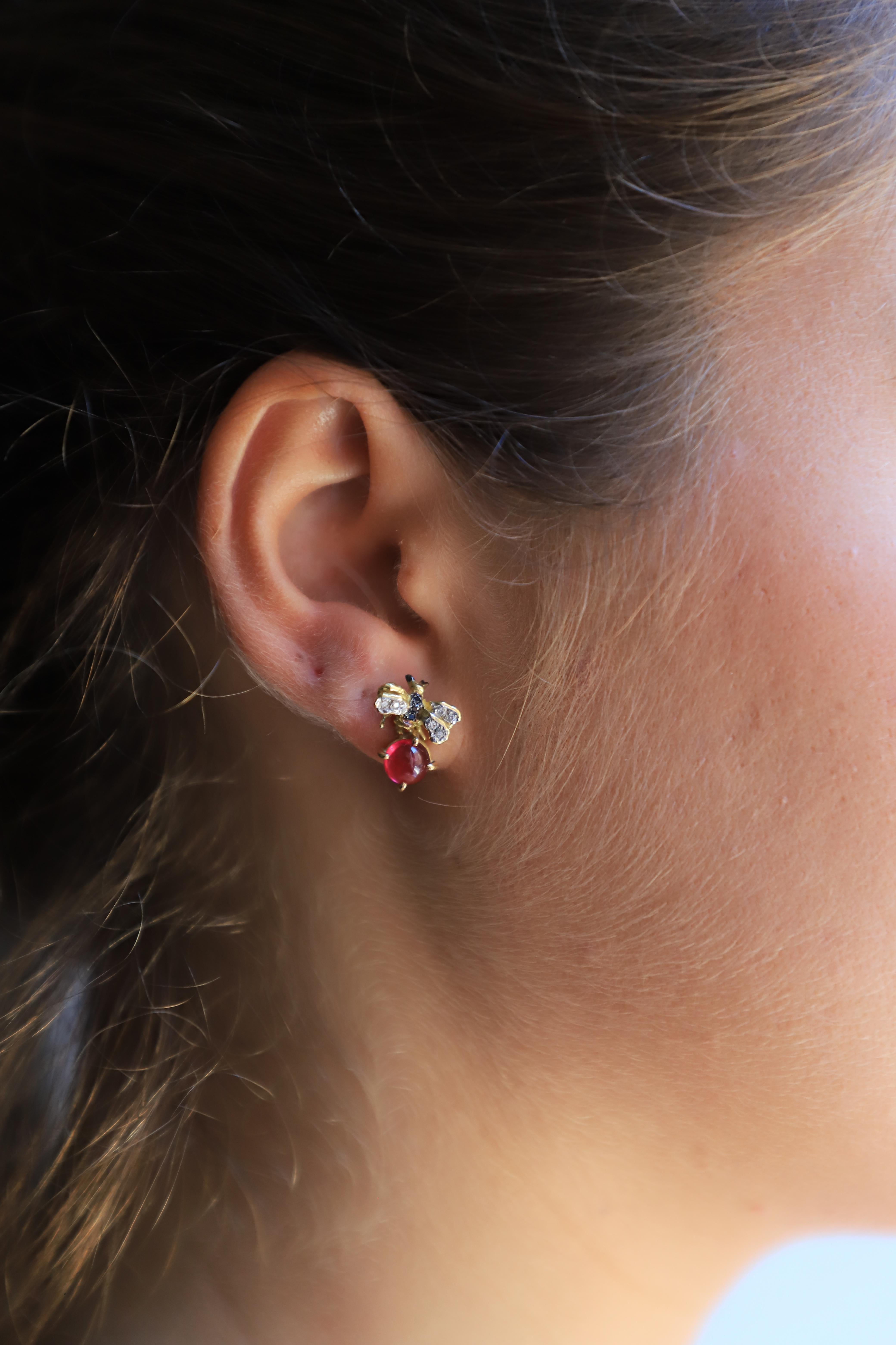Indulge in the allure of Rossella Ugolini's exquisite handcrafted earrings. These captivating 18K yellow gold stud earrings feature a stunning 3.50 karat rose-pink tourmaline, accented with delicate white and black diamonds. The beguiling rose-pink