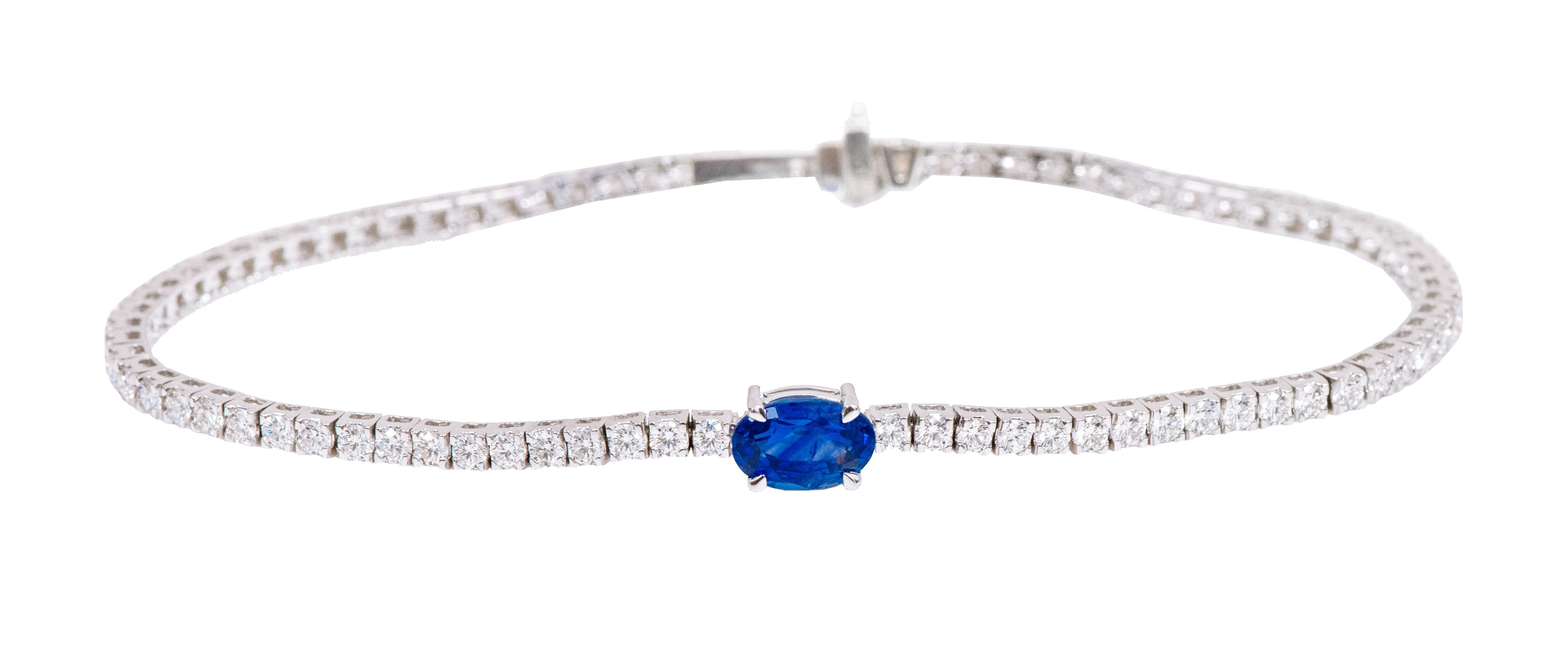 18 Karat White Gold 3.65 Carat Solitaire Blue Sapphire and Diamond Tennis Bracelet 

This exceptional royal blue sapphire and solitaire diamond tennis bracelet is fantastic. The classic tennis bracelet with identical, perfect cut and crowned round
