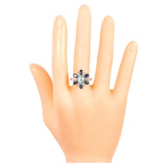 18 Karat Gold 3.91 Carat Paraiba Tourmaline, Sapphire, and Diamond Cocktail Ring