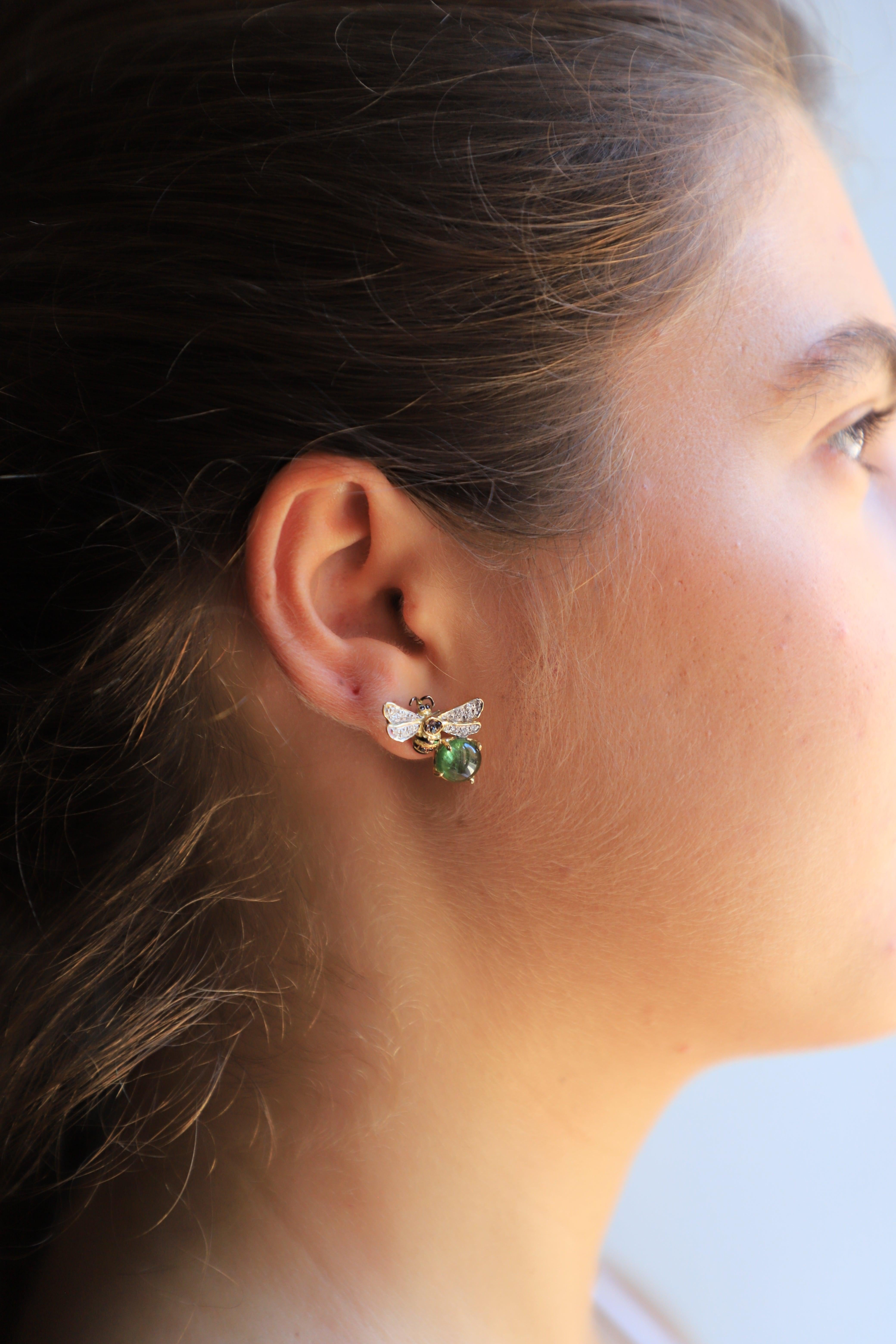Rossella Ugolini Bees Stud Earrings are a tribute to nature's splendor, handcrafted in Italy with unrivaled artistry.  Handcrafted in 18 Karat Yellow Gold 4 Karats Green Tourmaline 0.16 Karat White Diamond 0.18 Karat Black Diamonds. Unveiling the