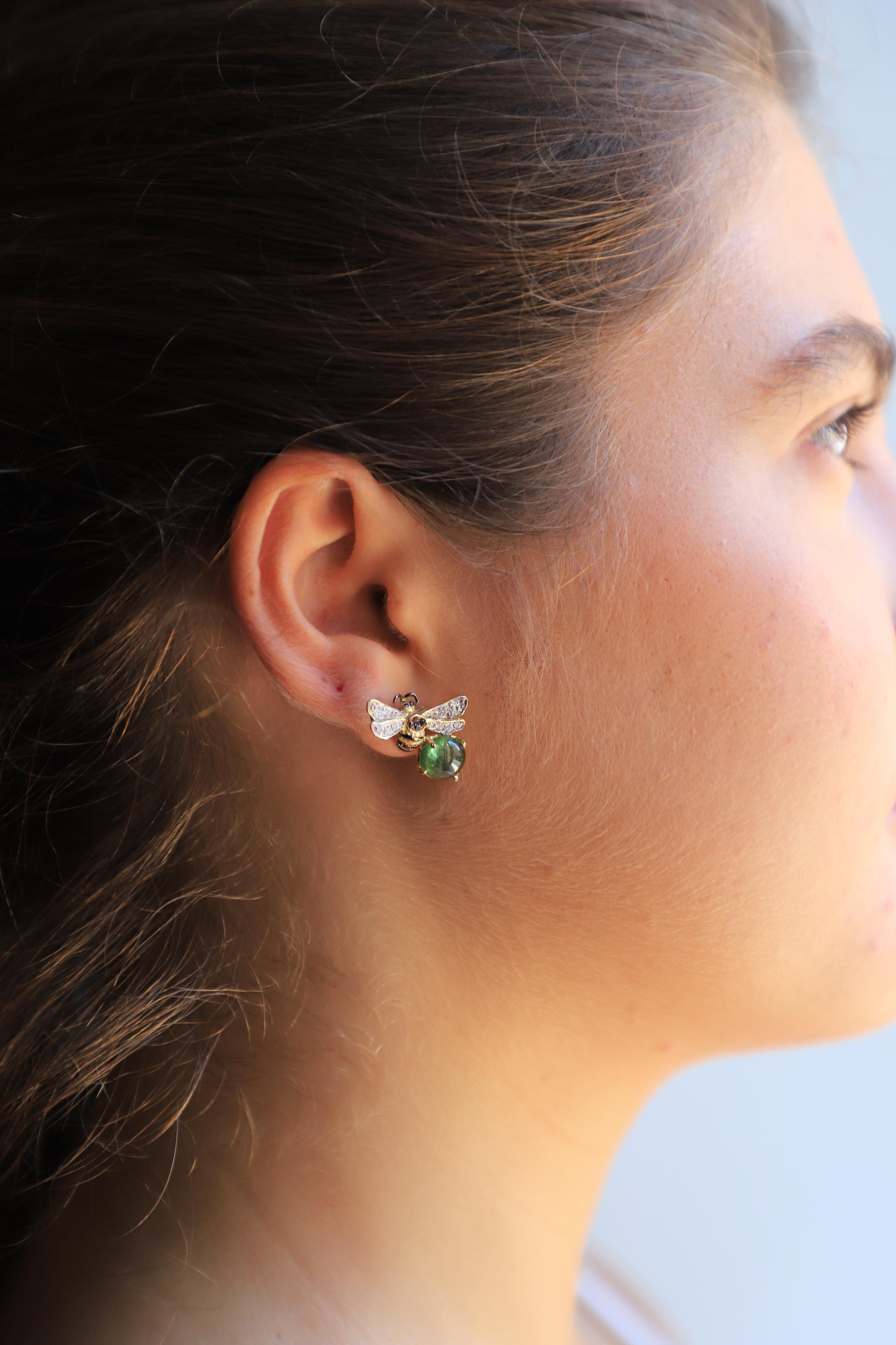 Rossella Ugolini Design Collection 18 Karat Yellow Gold 4 Carats Green Tourmaline 0.16 Carat White Diamond 0.18 Carat Black Diamonds Bees Handcrafted Stud Earrings. 
This collection was born to celebrate a precious creature, essential for our