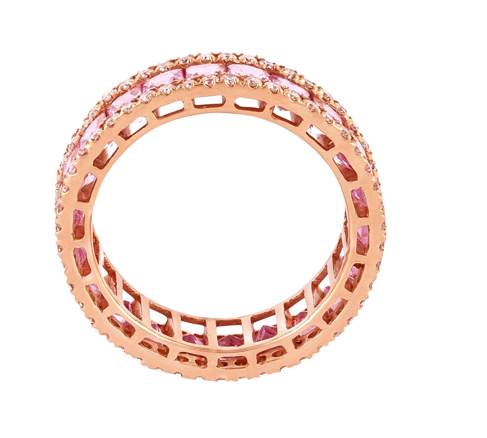 Step into a realm of opulence and grace with the 18 Karat Gold 4.05 Carat Diamond and Pink Sapphire Eternity Cocktail Ring. This resplendent masterpiece is a symphony of elegance and sophistication, bringing together the enchanting allure of pink