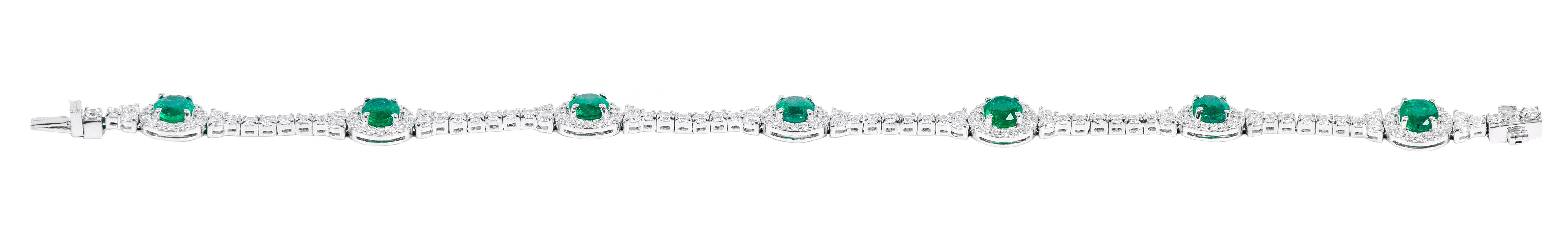 Women's 18 Karat Gold 4.17 Carat Natural Emerald and Diamond Cluster Tennis Bracelet For Sale