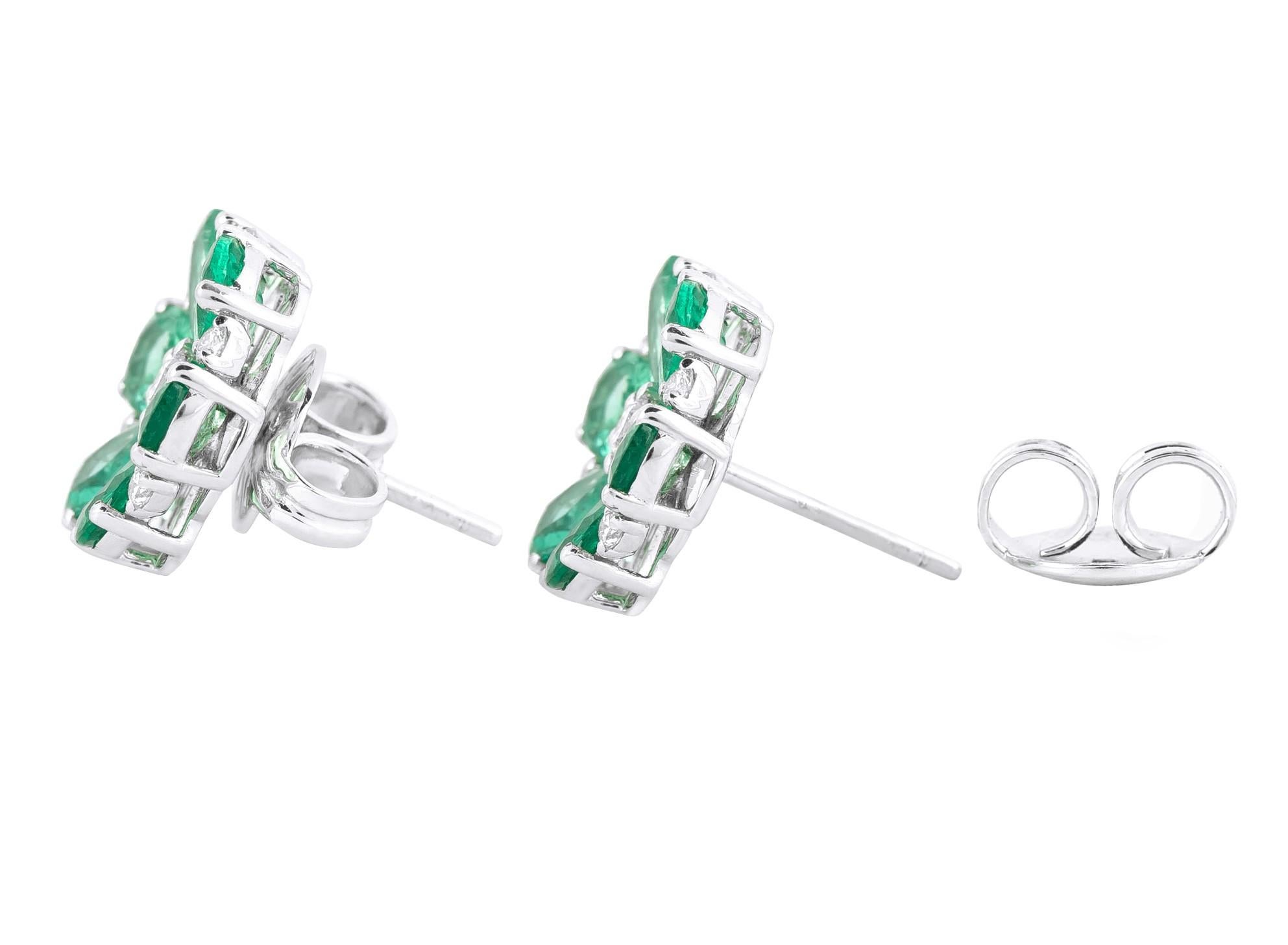 Pear Cut 18 Karat Gold 4.19 Carat Diamond and Emerald Flower Stud Earrings For Sale