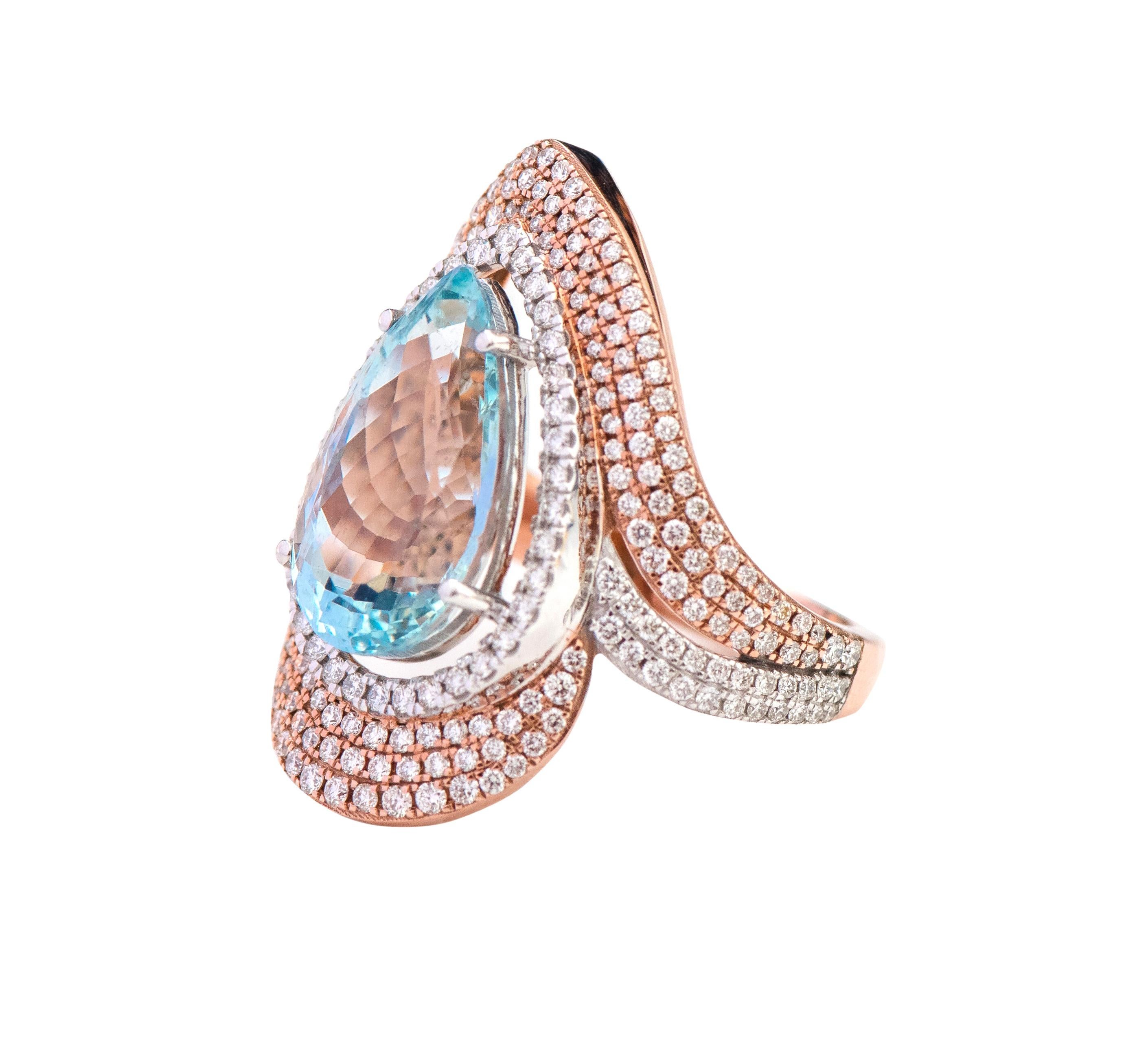 18 Karat Gold 5.15 Carat Pear-Cut Aquamarine and Diamond Cocktail Statement Ring

This sensational Santa maria aquamarine and diamond cluster broad cocktail ring is extraordinary. The design concept of the curvature flow on the ring is intriguingly