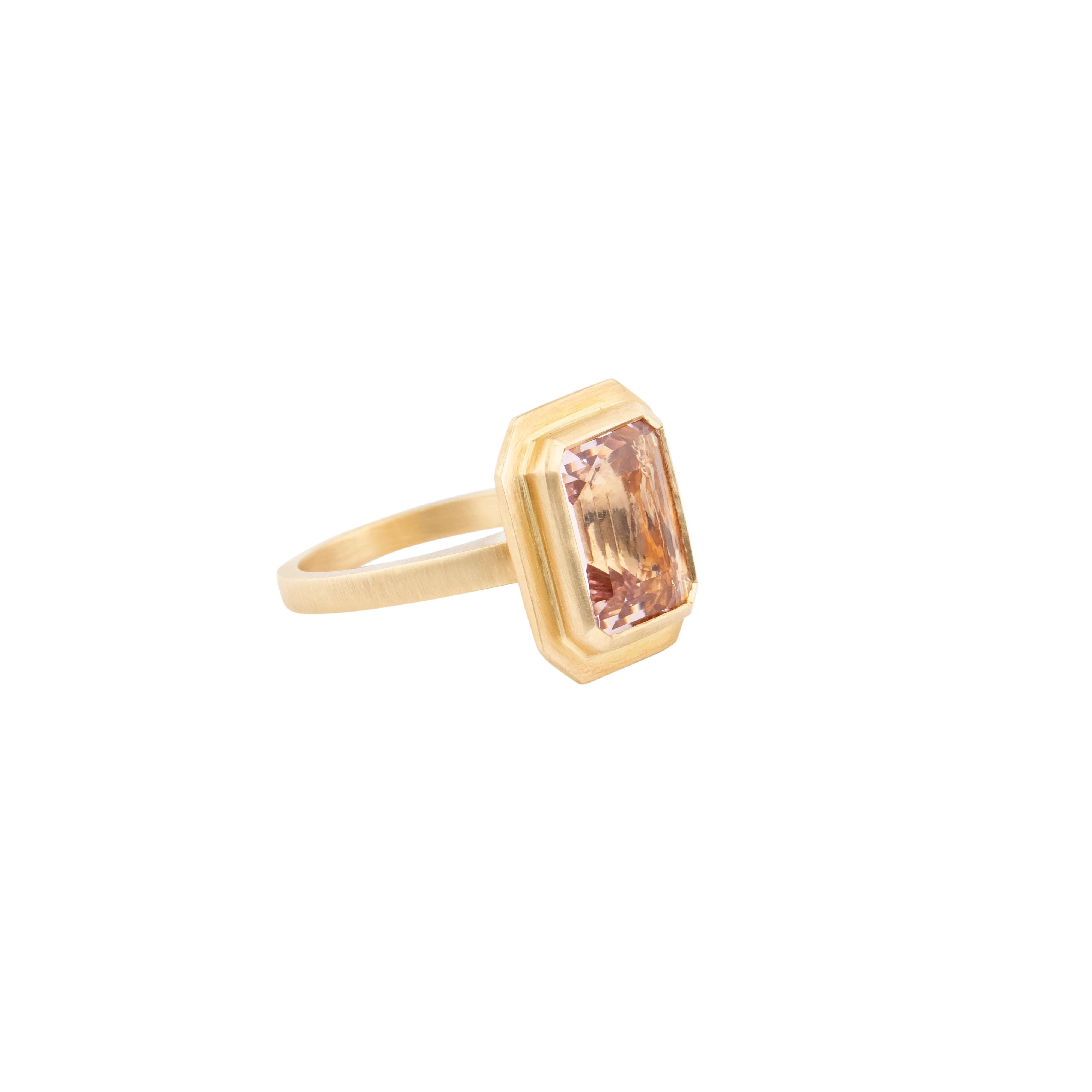 A stunning fusion of elegance and luxury, the 18 Karat Gold 5.17 Carat Morganite Solitaire Ring showcases the timeless beauty of Morganite, meticulously set in a refined design. Crafted with precision, each piece is a testament to expert