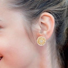 18 Karat Gold 5.69 Carat Fancy Yellow and White Diamond Solitaire Stud Earrings