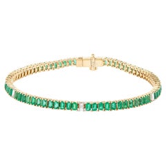 Bracciale tennis in oro 18 carati con smeraldo e diamante da 5,71 carati