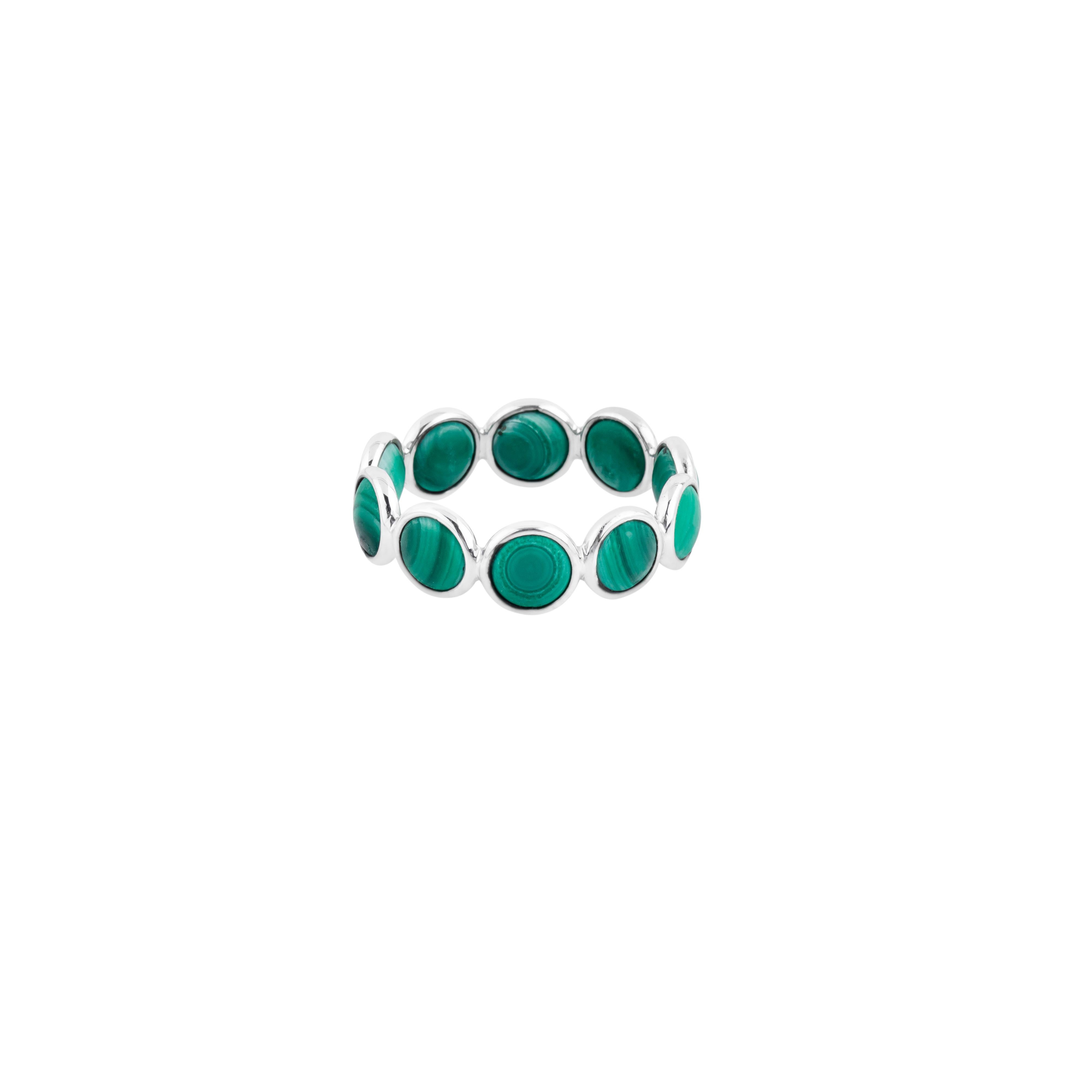 A 5.77-carat malachite is meticulously crafted into this exceptional 18 Karat Gold infinity band ring, embodying a seamless blend of elegance and symbolism. The malachite’s natural striations and rich texture create a visual masterpiece,
