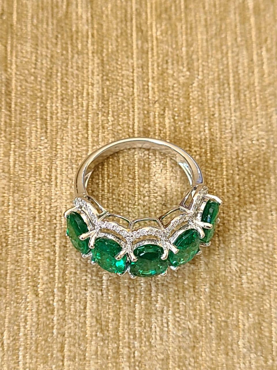 Art Deco 18 Karat Gold, 6.12 Carats Emerald and Diamonds Band Ring