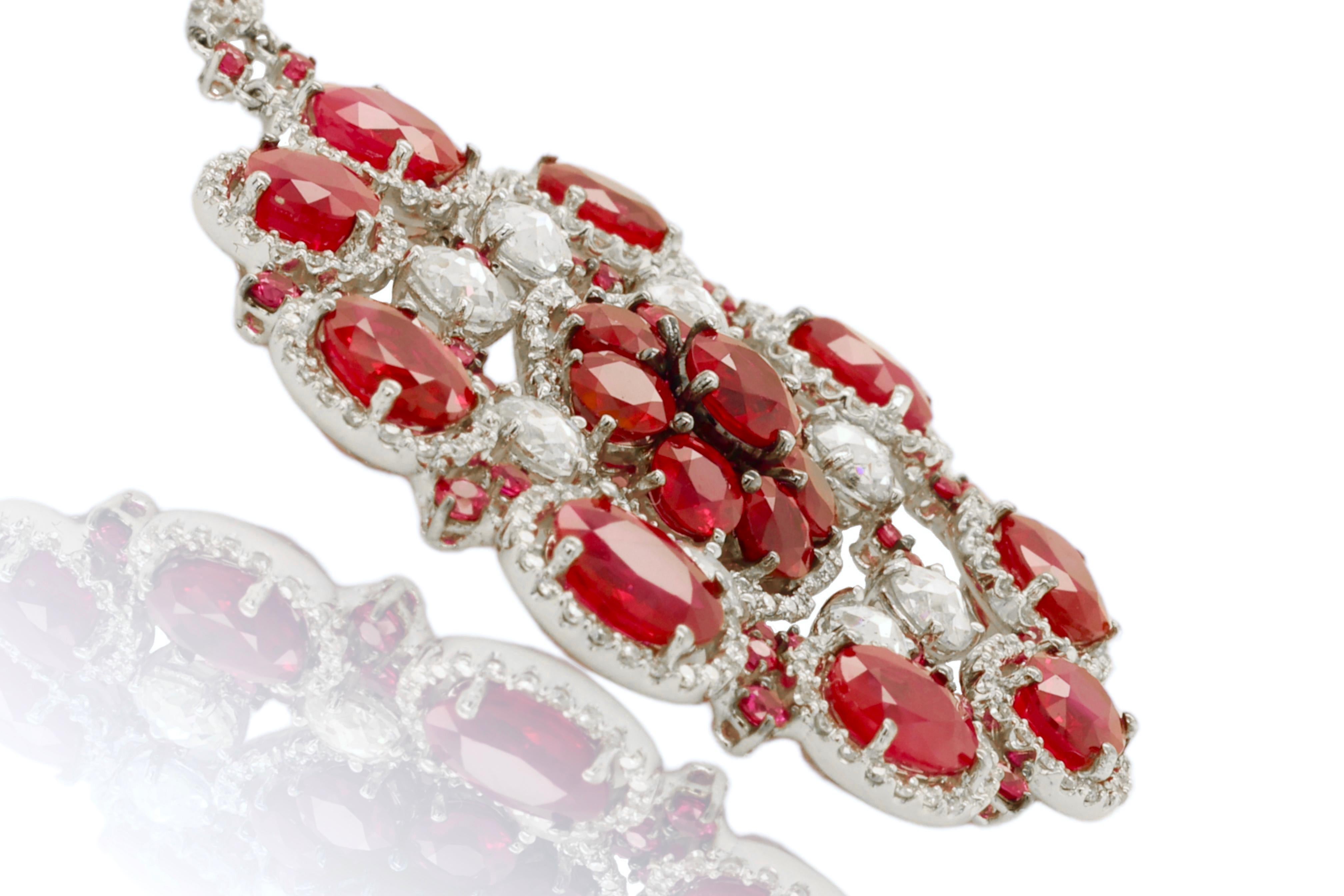 Oval Cut 18 Karat Gold 62.15 Carat Ruby & 5.93 Carat Diamonds Dangle Earrings For Sale