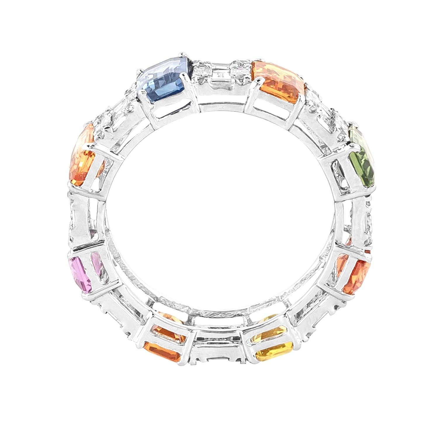 Crafted with precision and imbued with sophistication, the 18 Karat Gold 6.46 Carat Diamond and Multi-Sapphire Eternity Cocktail Ring is a testament to opulence and artistry. This exquisite ring embodies a fusion of classic glamour and contemporary