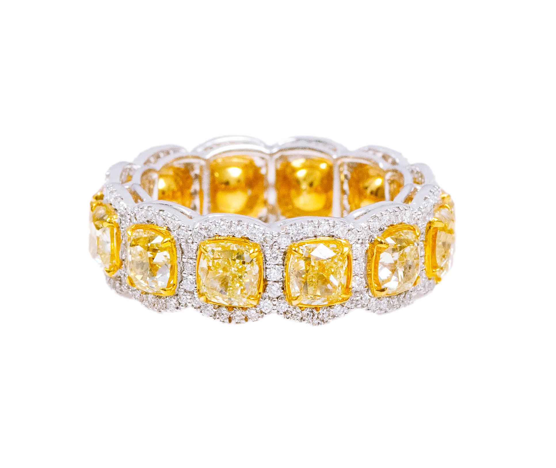 18 Karat Gold 6.84 Carat Fancy Yellow and Diamond Eternity Band Ring

Elevate your jewelry collection to new heights with our 6.84 Carat Fancy Yellow and Diamond Eternity Band Ring—a timeless masterpiece that embodies opulence, vibrancy, and