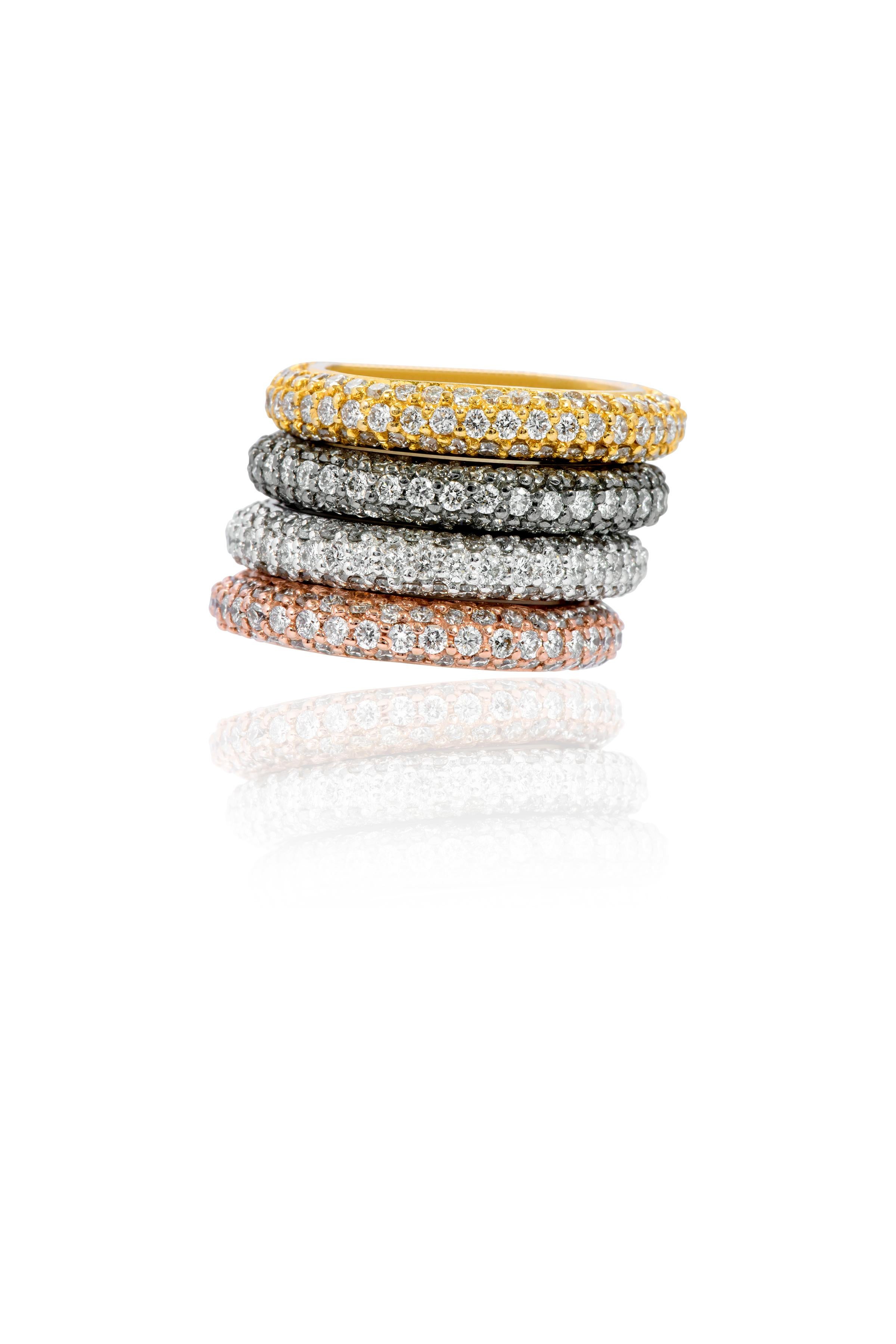 18 Karat Gold 6.90 Carat Diamond Brilliant-Cut Eternity Ring in Four Gold Colors

These phenomenal three row pave set 4 identical diamond bands are beautiful. They’re the classic pave set round diamond band with three leveled rows highlighting each