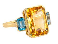 18 Karat Gold 7.79 Carat Blue & Yellow Topaz "Three Stone" Ring