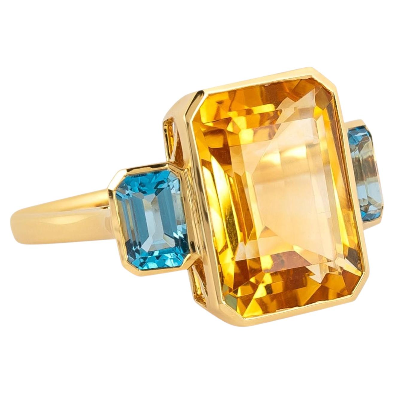 Anello "Three Stone" in oro 18 carati con topazi blu e gialli da 7,79 carati