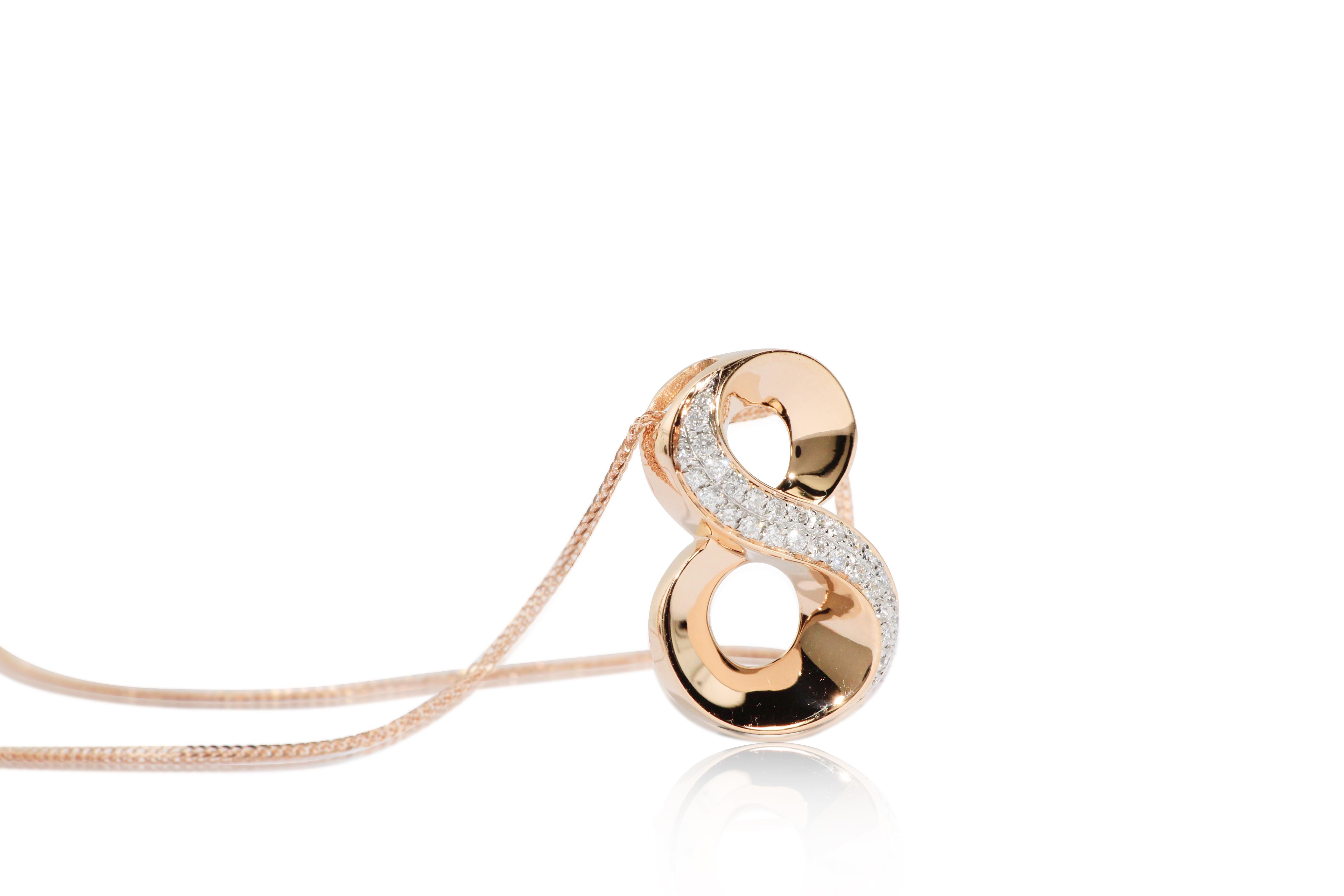 The number “8” pendant , set with diamonds weighing 0.21 carats, mounted in 18 Karat gold, available in different colours (yellow gold and rose gold)
The number 