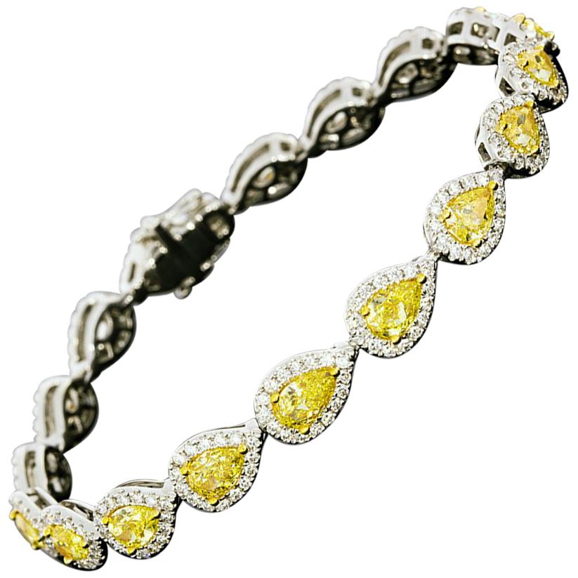 18 Karat Gold 8.51 Carat Fancy Yellow Pear Diamond Halo Tennis Bracelet
