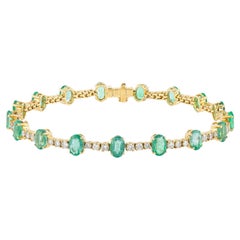 Bracciale tennis in oro 18 carati con smeraldo e diamanti da 8,7 carati