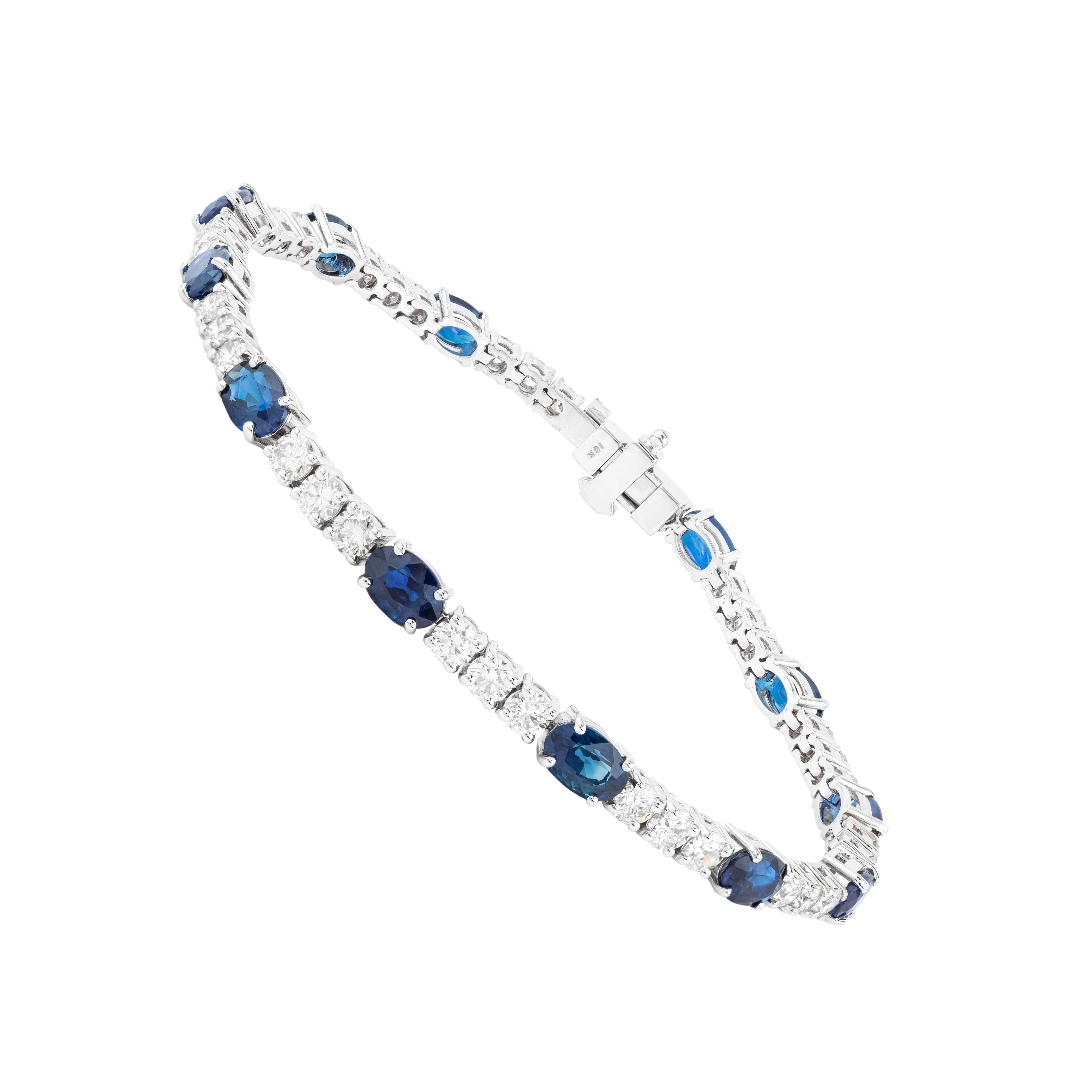 A breathtaking union of timeless elegance and expert craftsmanship, the 18 Karat Gold Tennis Bracelet showcases 9.16 carats of sapphires and diamonds in perfect harmony. Each sapphire is precision-cut to accentuate its natural brilliance, while the