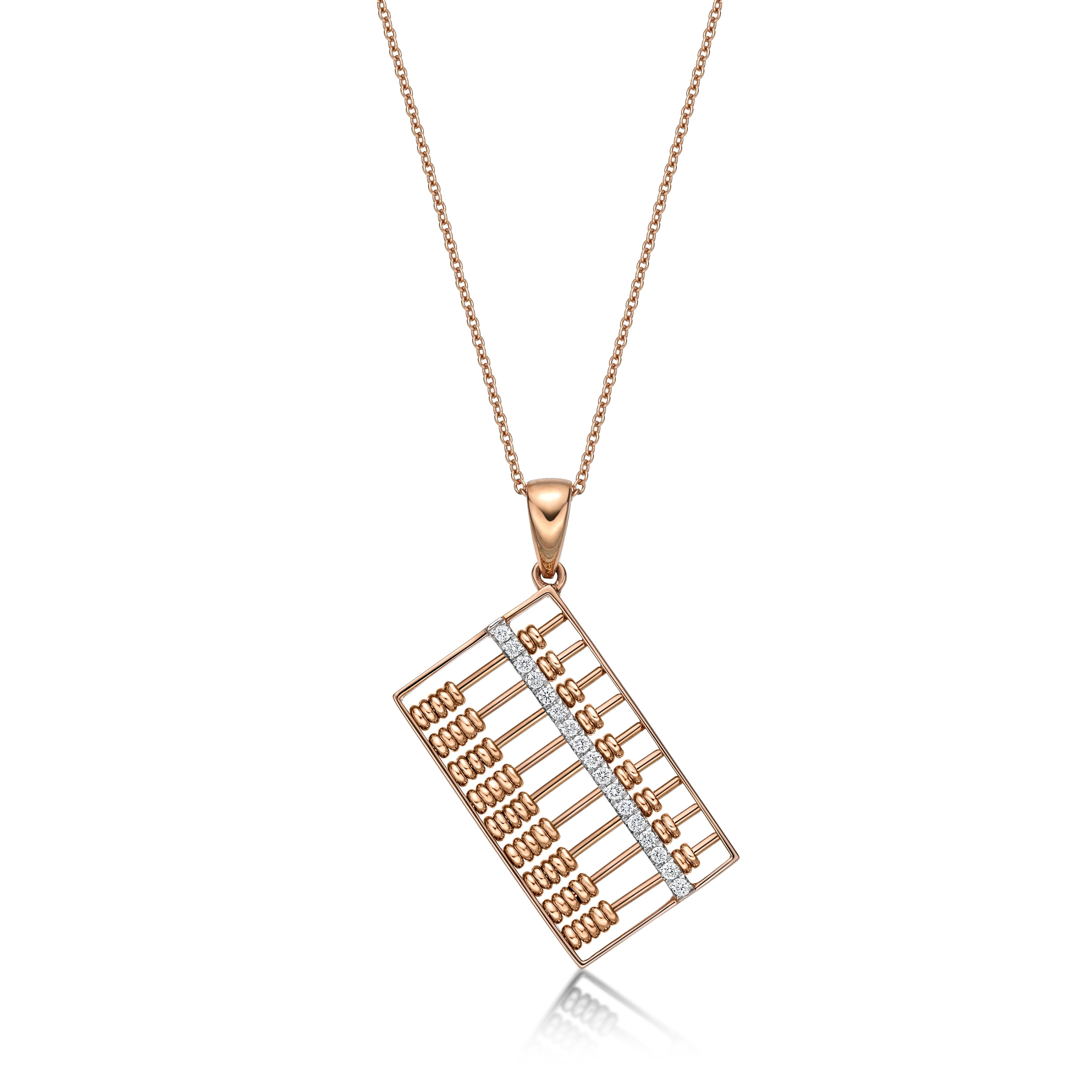 Abacus pendant with moving beads, set with diamonds  surround frame weighing 0.09 carats, mounted in 18 Karat rose gold.
Abacus, invented in ancient China  more than 2,600 years ago, is a traditional computing tool for businesses and widely used in