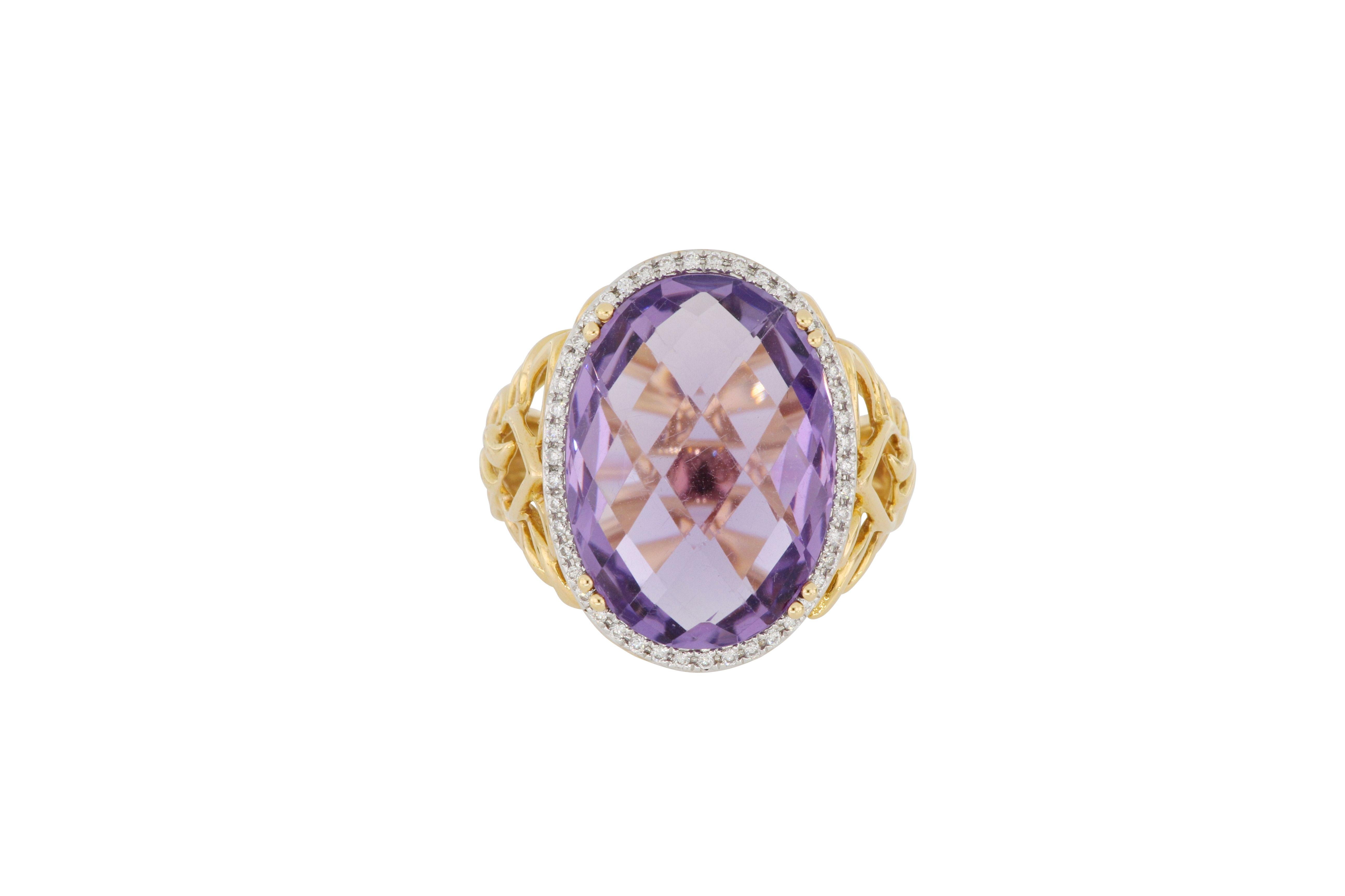 A natural amethyst and brilliant-cut diamond ring, centering a 11.12 carats oval-shaped amethyst, framed by brilliant cut diamonds totalling  0.14 carats diamonds, mounted in 18 karat rose gold. It is a fabulous piece of jewellery with beautiful