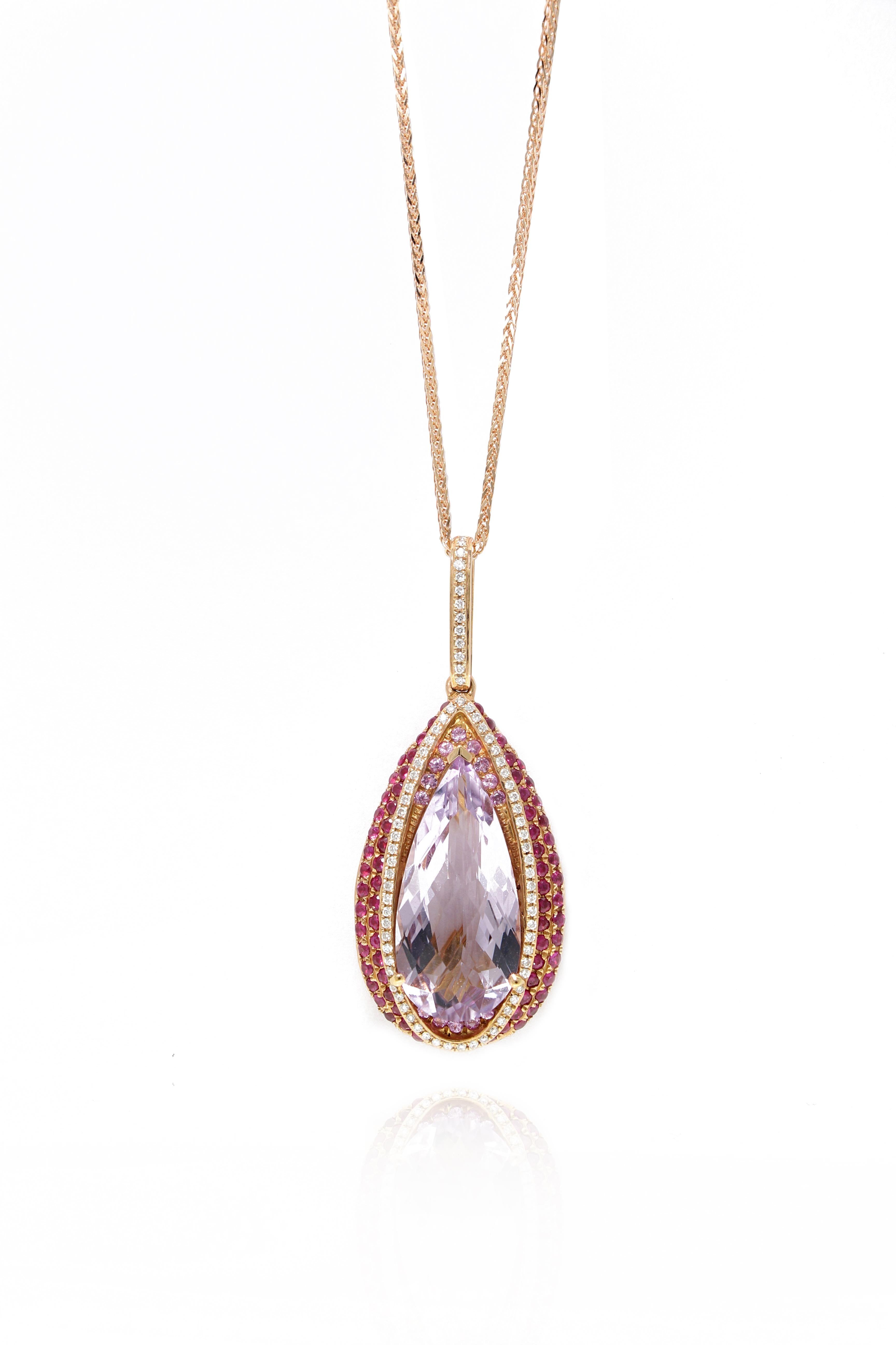 A natural amethyst and pink sapphire diamond pendant, centering a 7.8 carats pear-shaped amethyst, framed by brilliant cut diamonds totalling  0.21 ct diamonds, 0.93 ct rubies and 0.20 ct pink sapphire mounted in 18 karat rose gold. It is a fabulous